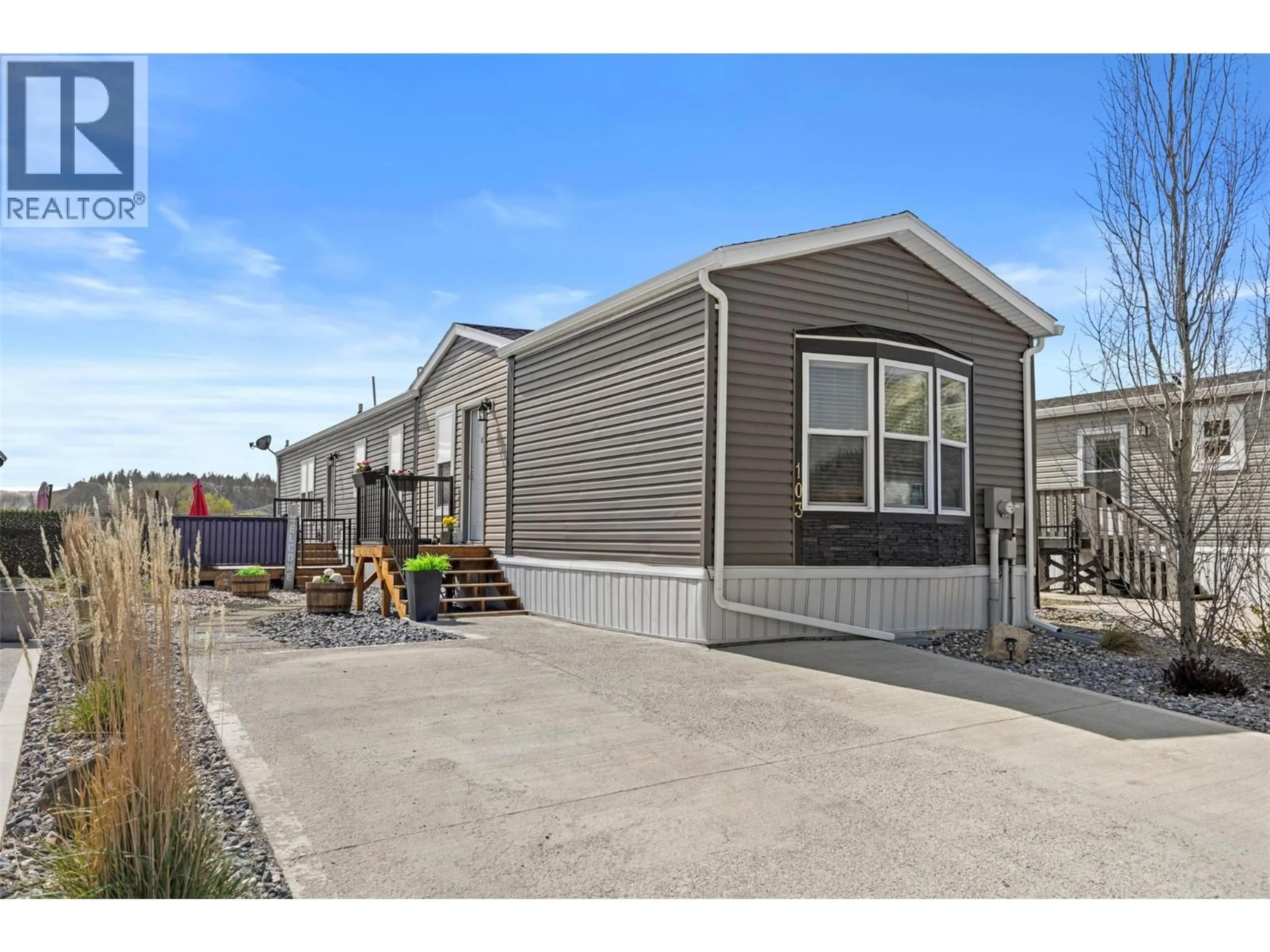 Home with vinyl exterior material, street for 103 - 5005 RIVER ROAD, Pritchard British Columbia V0E2P0