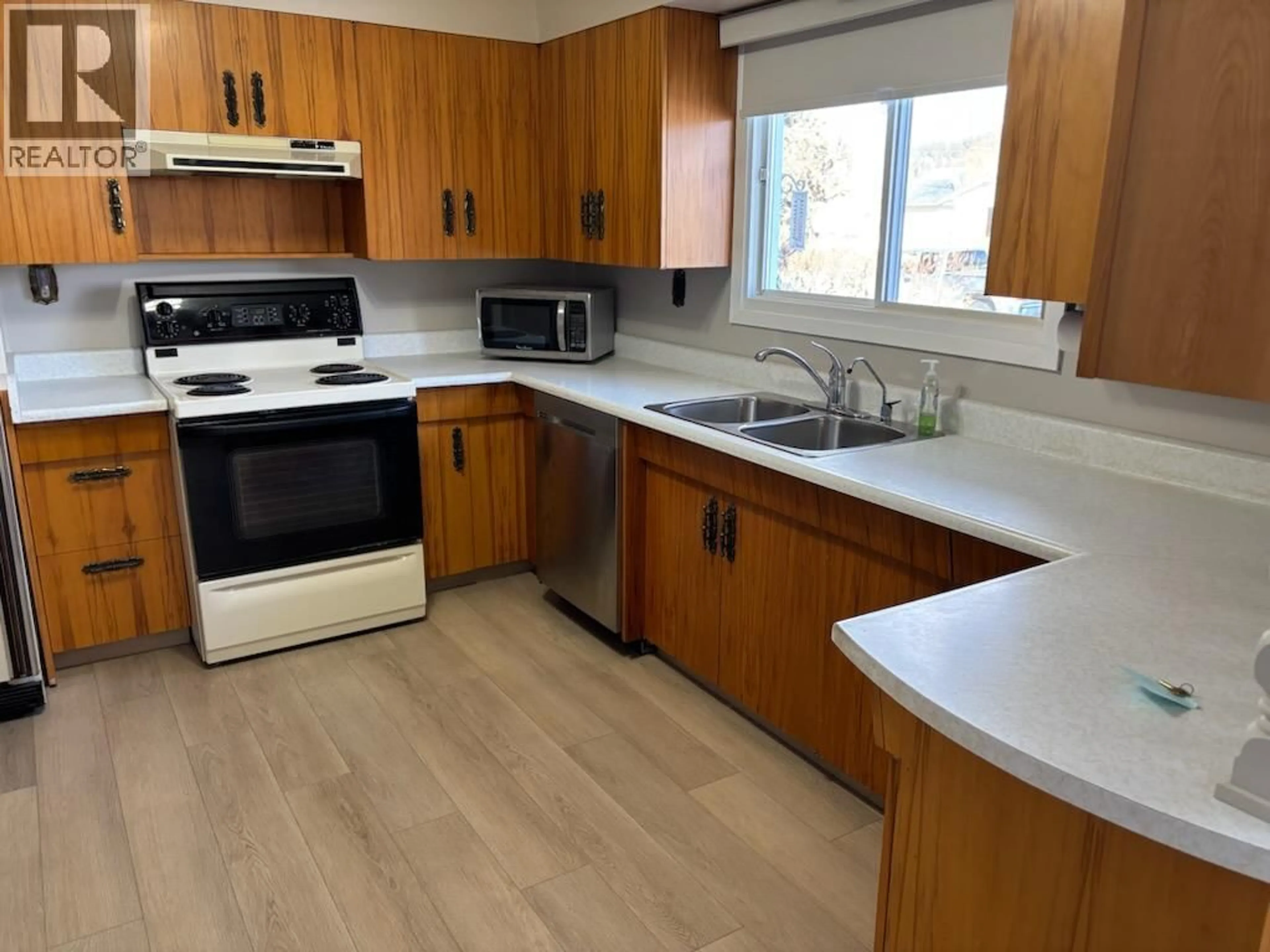 Standard kitchen, wood/laminate floor for 7551 23RD STREET, Grand Forks British Columbia V0H1H2