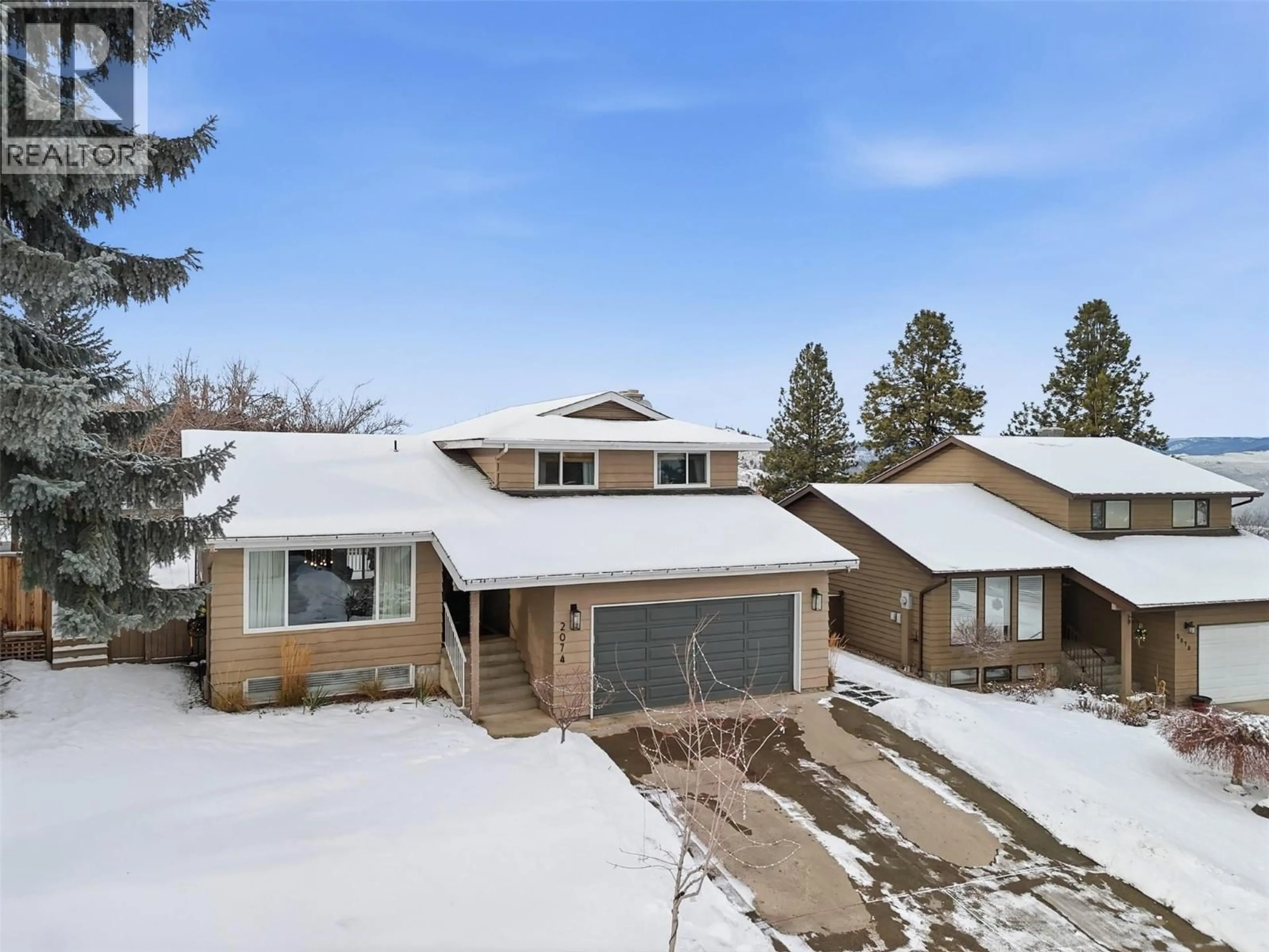 A pic from outside/outdoor area/front of a property/back of a property/a pic from drone, street for 2074 HAMPSHIRE DRIVE, Kamloops British Columbia V1S1E5