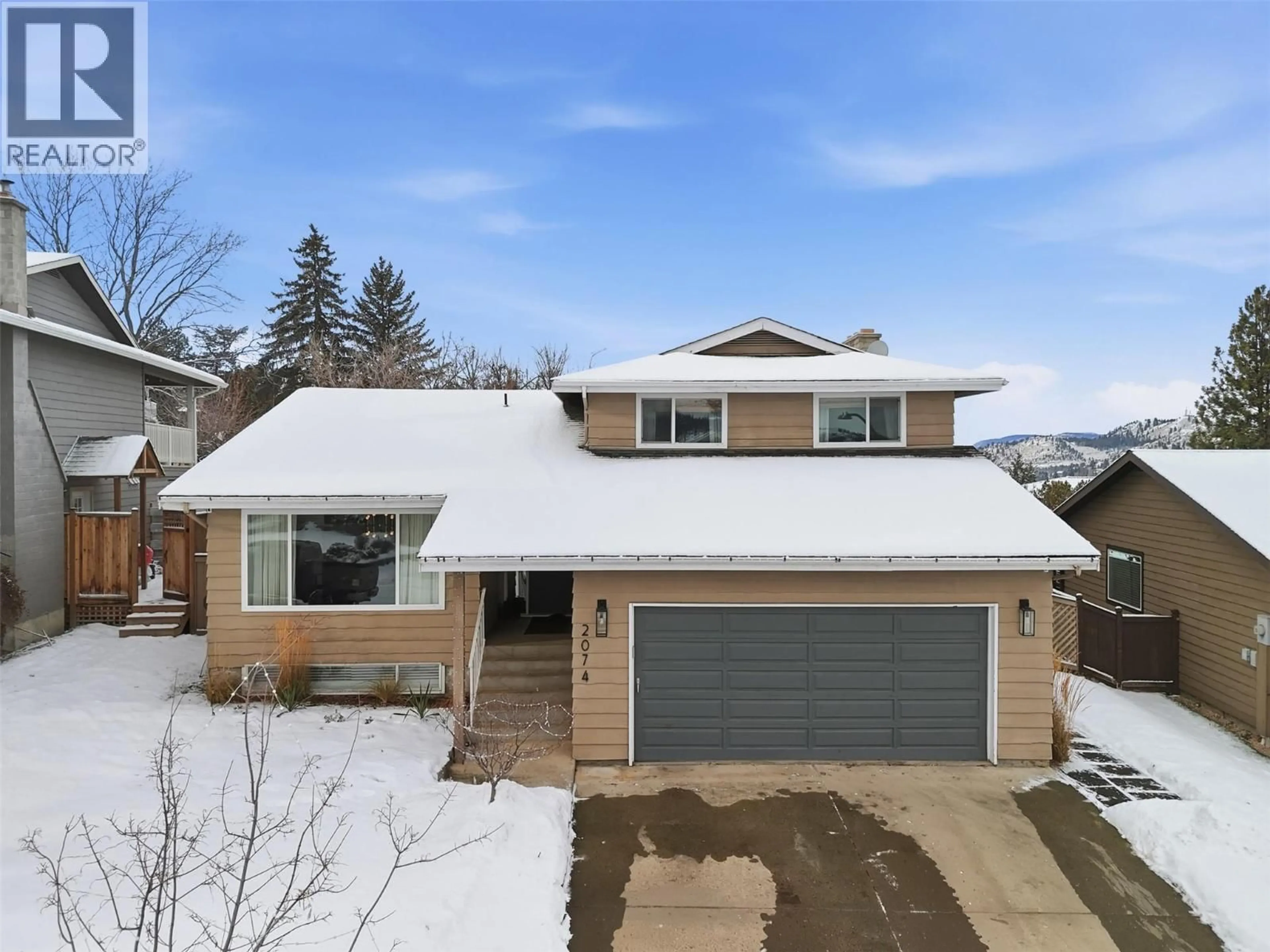 Home with vinyl exterior material, street for 2074 HAMPSHIRE DRIVE, Kamloops British Columbia V1S1E5