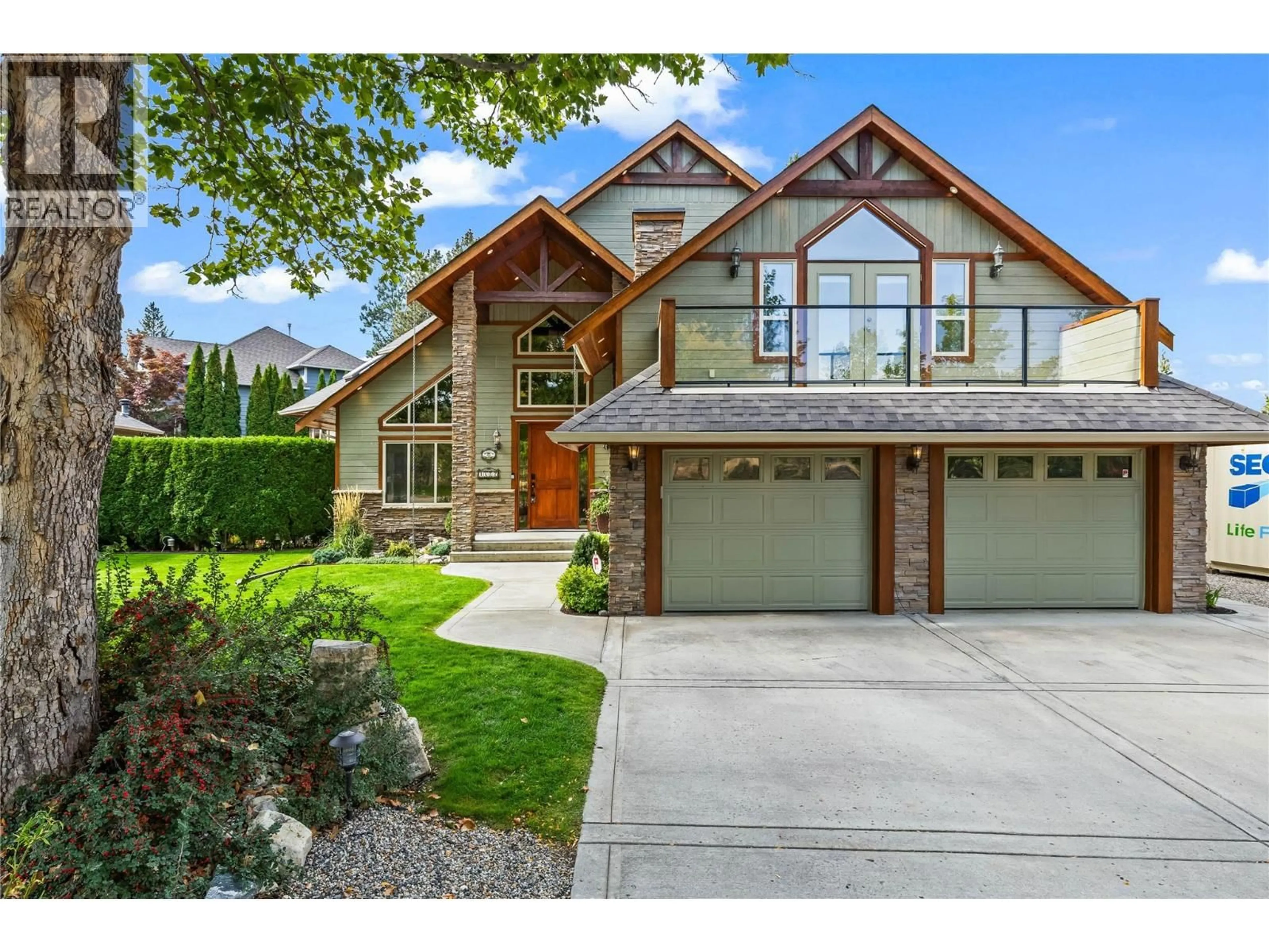 Home with brick exterior material, street for 1682 LARKRIDGE COURT, Kelowna British Columbia V1W4N5