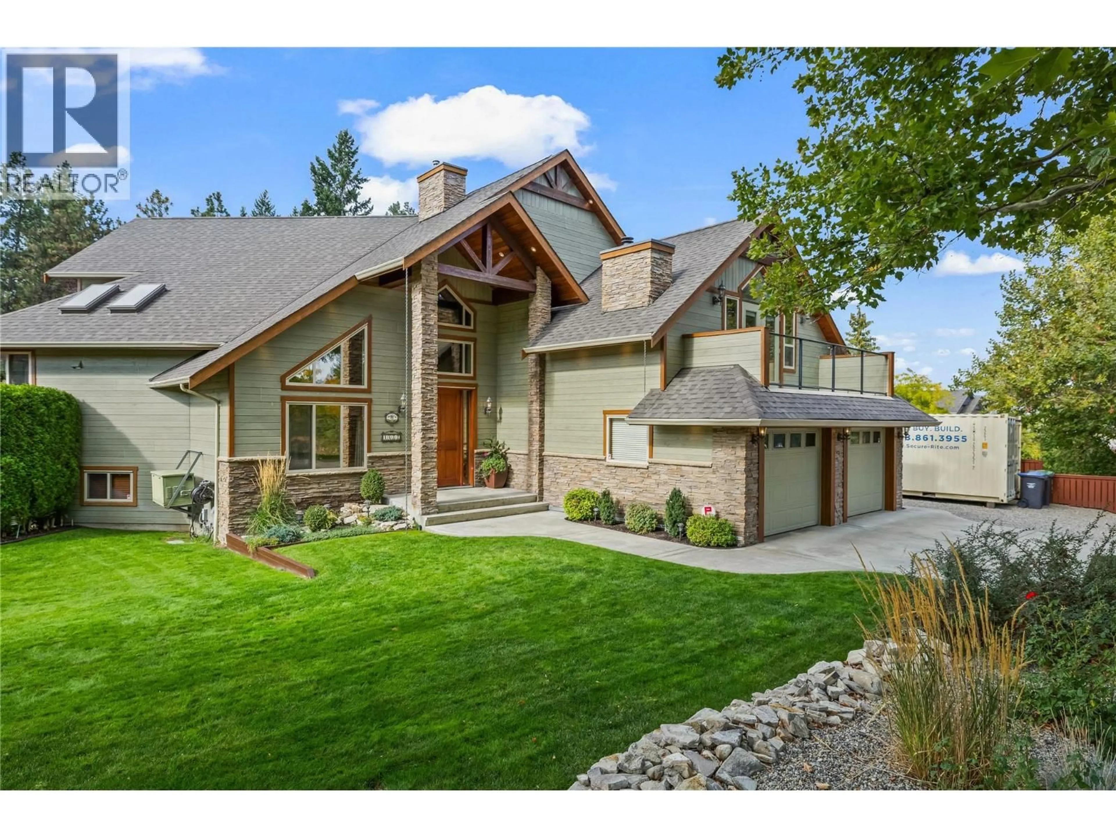 Home with brick exterior material, mountain view for 1682 LARKRIDGE COURT, Kelowna British Columbia V1W4N5