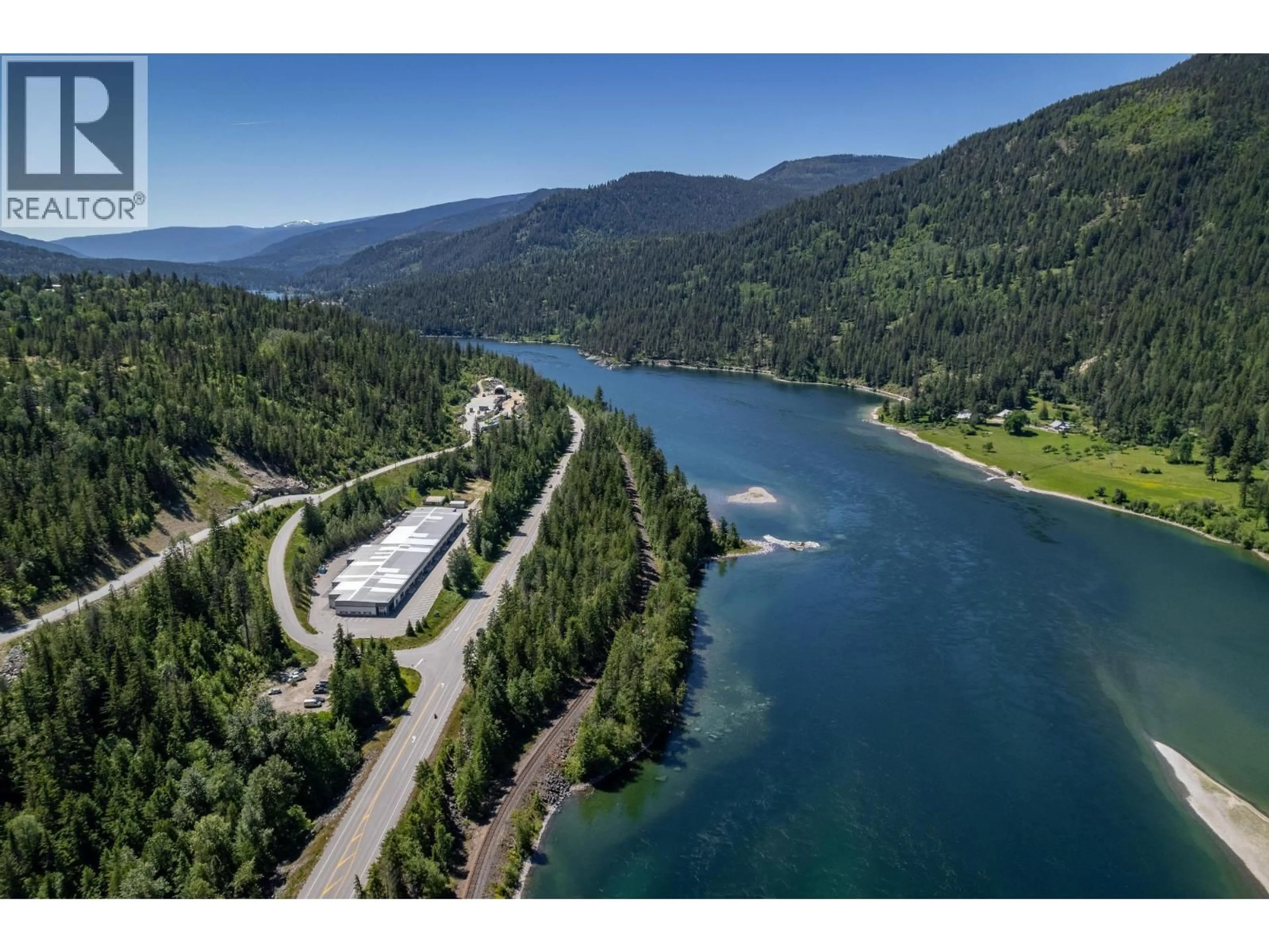 A pic from outside/outdoor area/front of a property/back of a property/a pic from drone, water/lake/river/ocean view for 12, 13, 14 - 1155 INSIGHT DRIVE, Nelson British Columbia V1L5P5