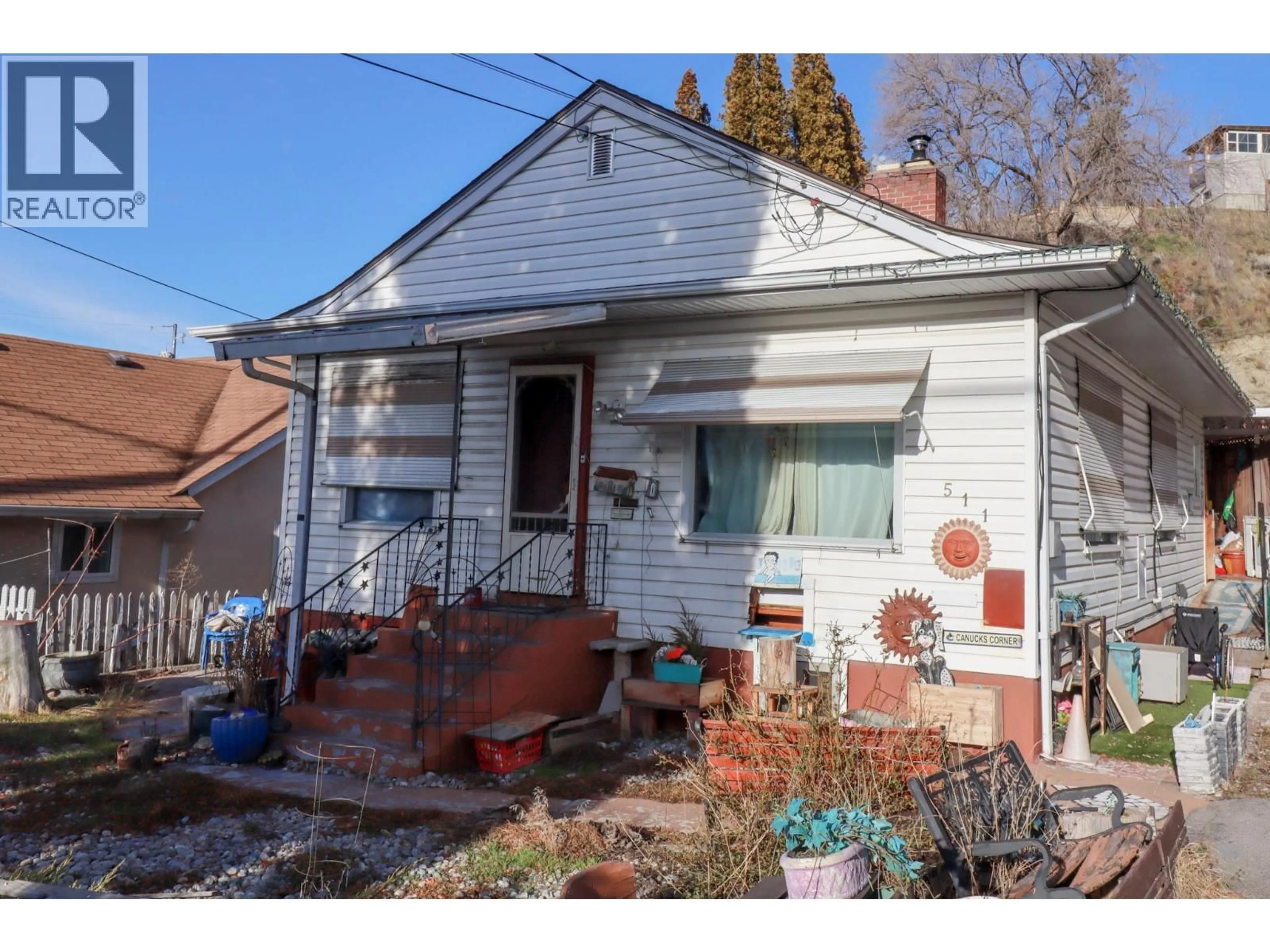 Home with brick exterior material, street for 511 WADE AVENUE EAST, Penticton British Columbia V2A1T2