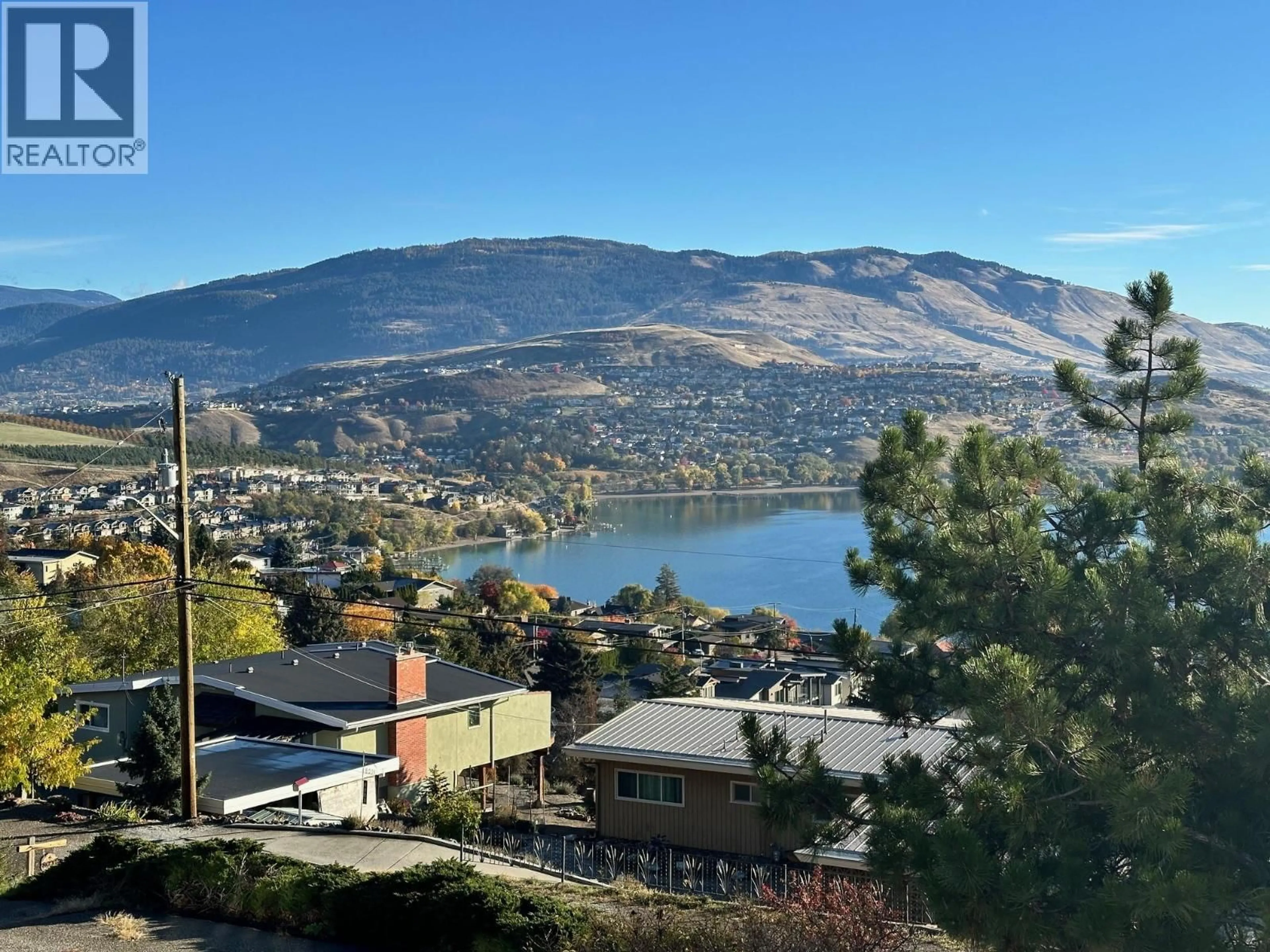 A pic from outside/outdoor area/front of a property/back of a property/a pic from drone, water/lake/river/ocean view for 7910 LAKEVIEW DRIVE, Coldstream British Columbia V1B1W3