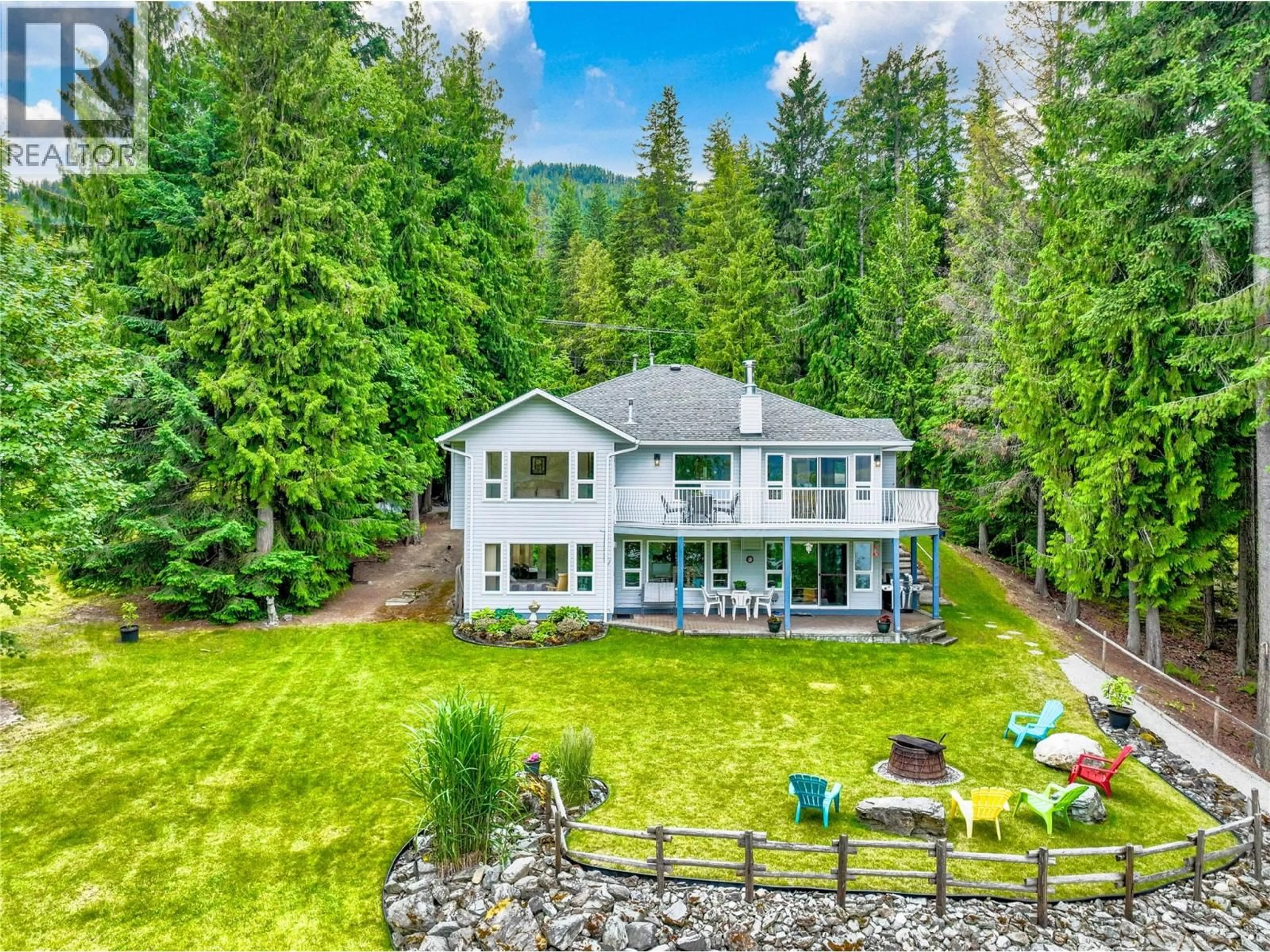 A pic from outside/outdoor area/front of a property/back of a property/a pic from drone, water/lake/river/ocean view for 4283 EAGLE BAY ROAD, Eagle Bay British Columbia V0E1T0