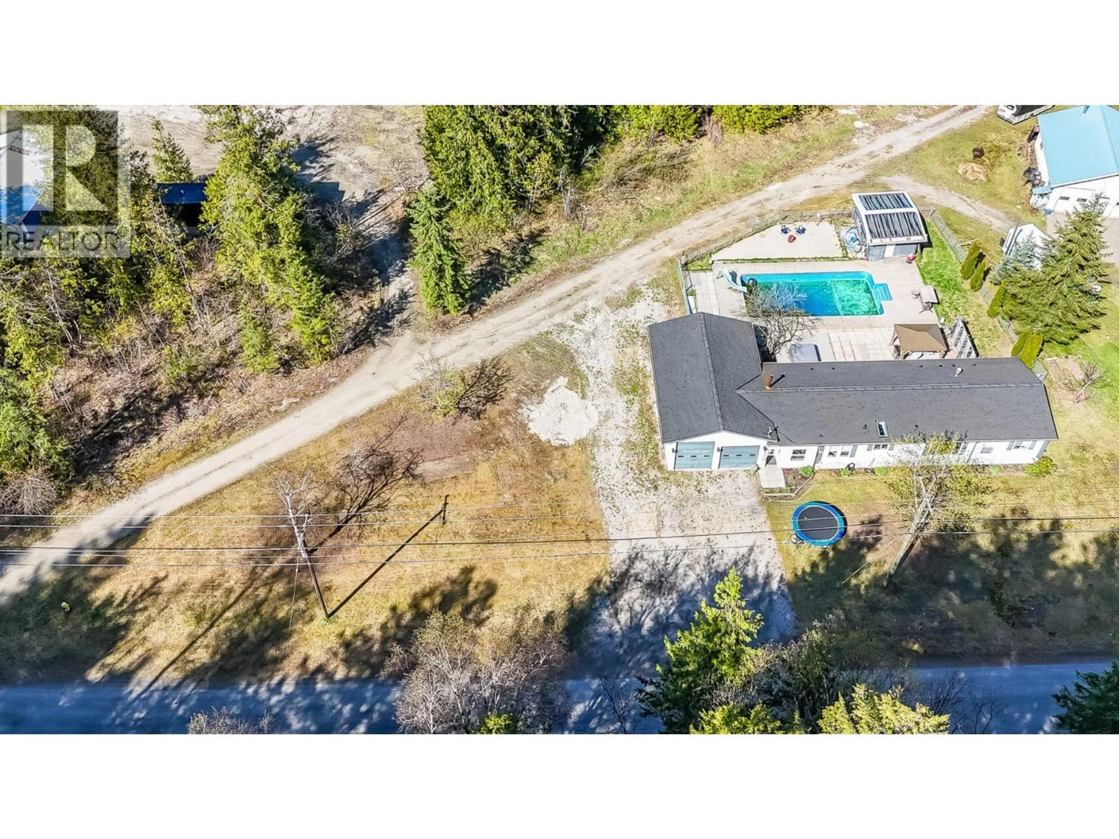 A pic from outside/outdoor area/front of a property/back of a property/a pic from drone, water/lake/river/ocean view for 1740 ILLECILLEWAET ROAD, Revelstoke British Columbia V0E2S1