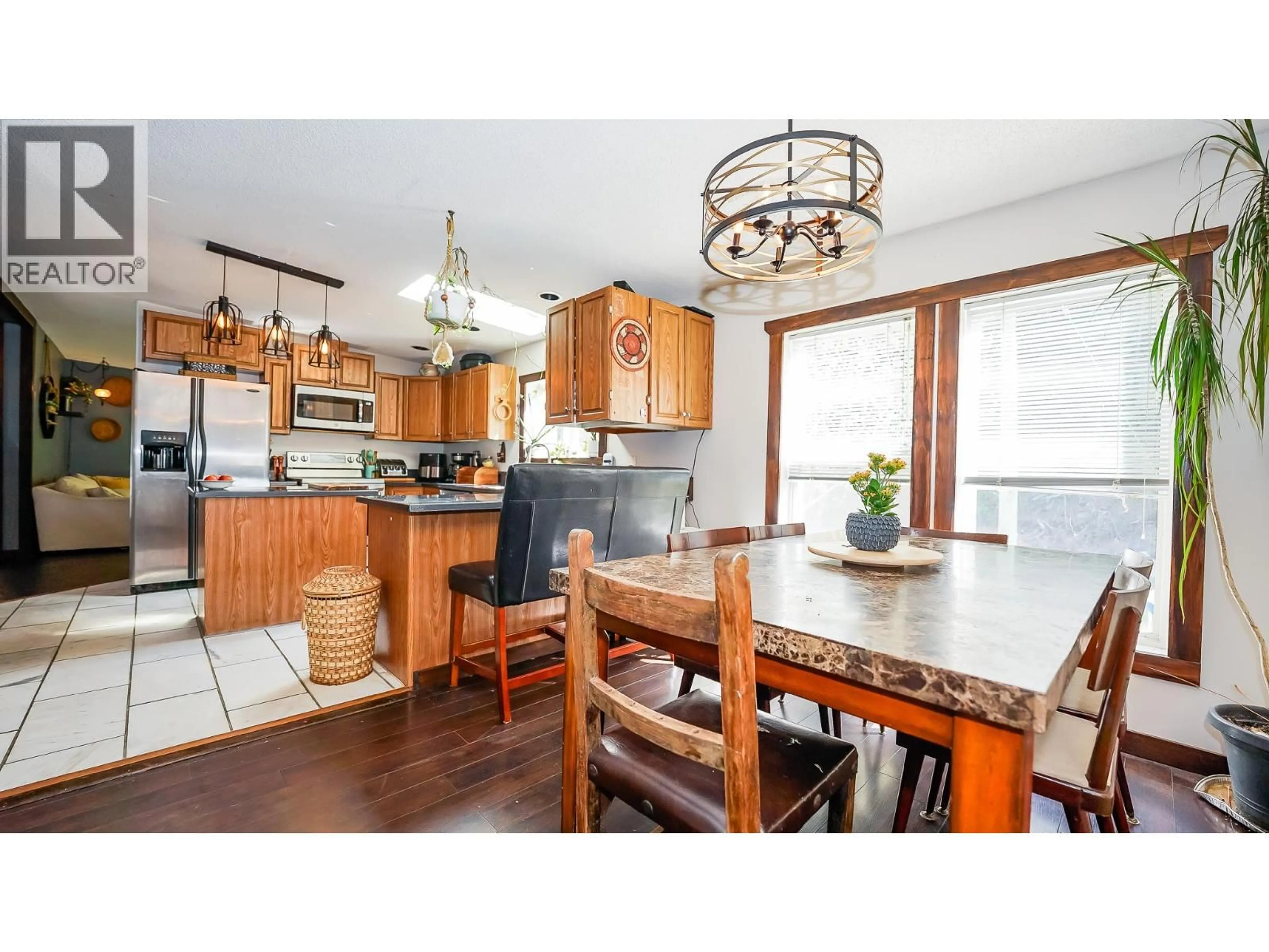 Open concept kitchen, wood/laminate floor for 1740 ILLECILLEWAET ROAD, Revelstoke British Columbia V0E2S1