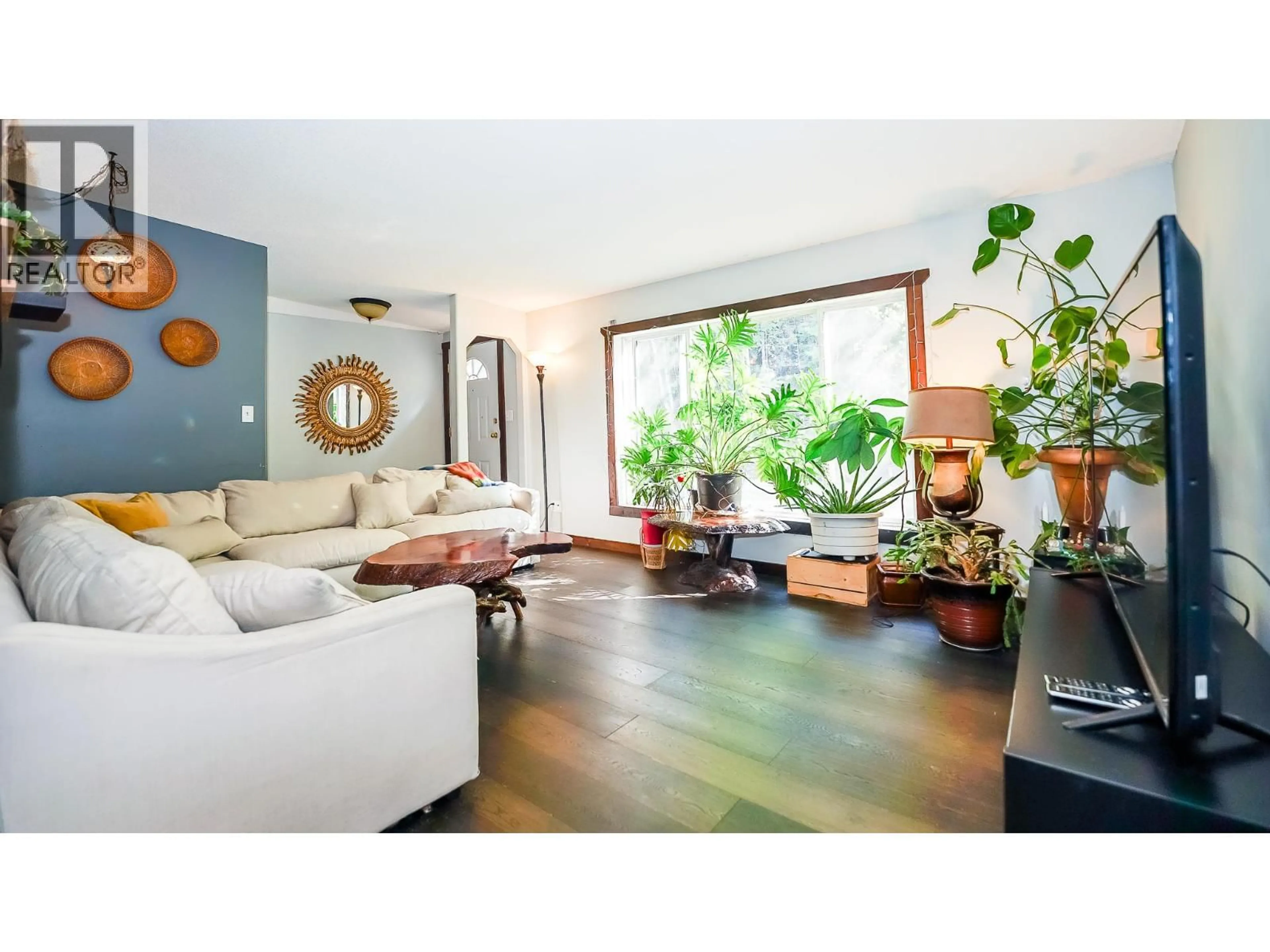 Living room with furniture, wood/laminate floor for 1740 ILLECILLEWAET ROAD, Revelstoke British Columbia V0E2S1
