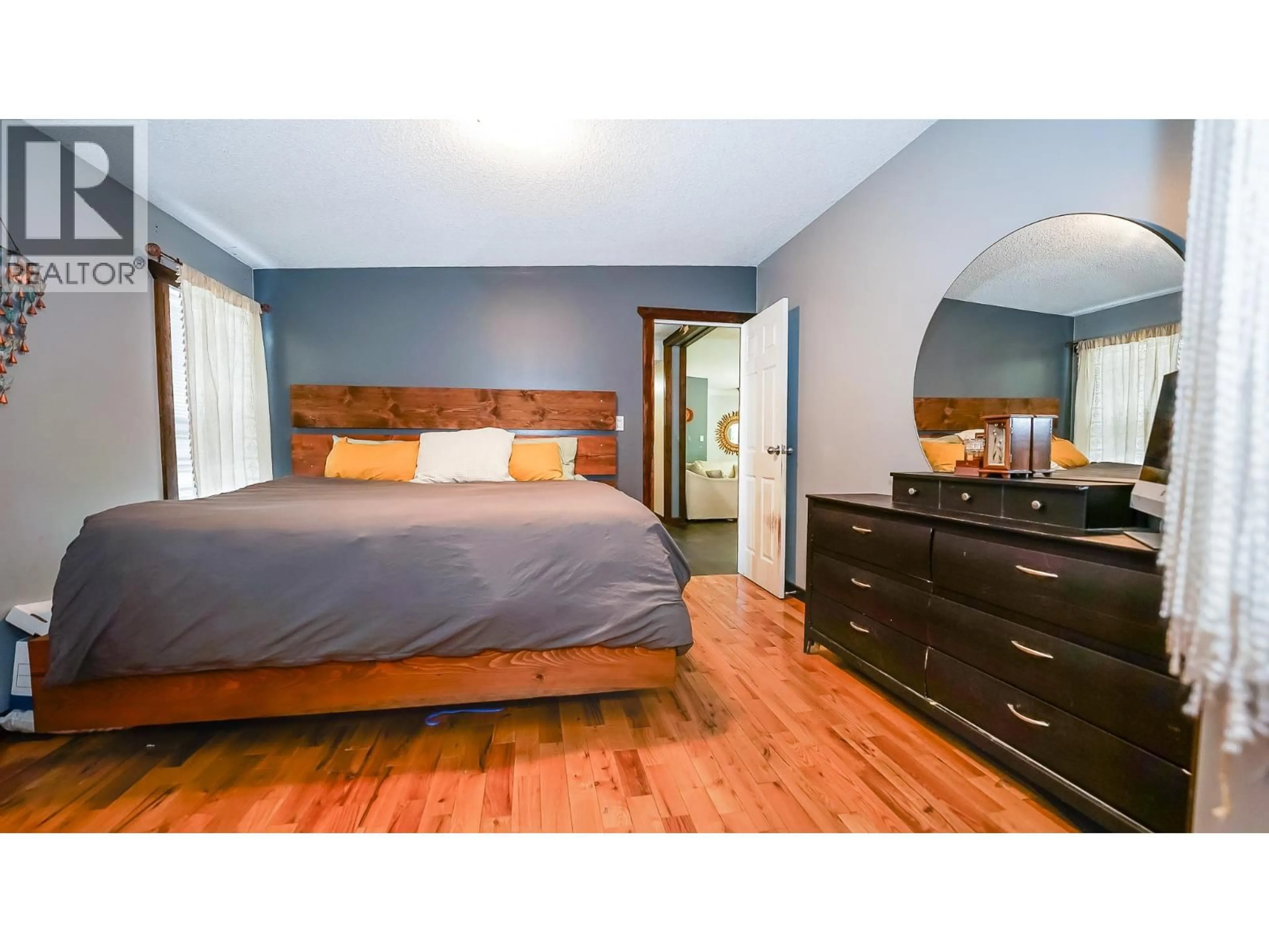 Bedroom with bed, wood/laminate floor for 1740 ILLECILLEWAET ROAD, Revelstoke British Columbia V0E2S1