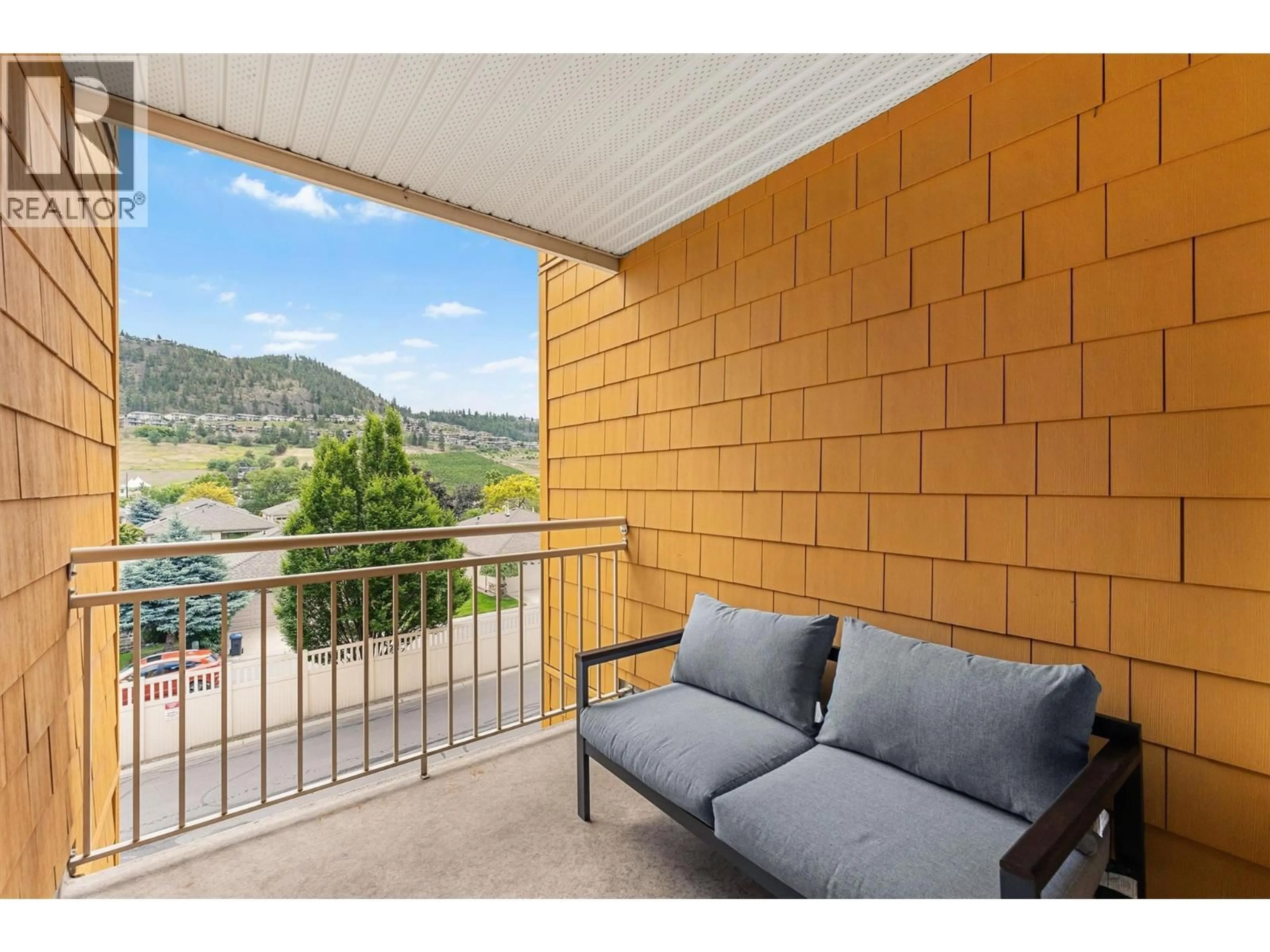 Balcony in the apartment, mountain view for 404 - 571 YATES ROAD, Kelowna British Columbia V1V2V5