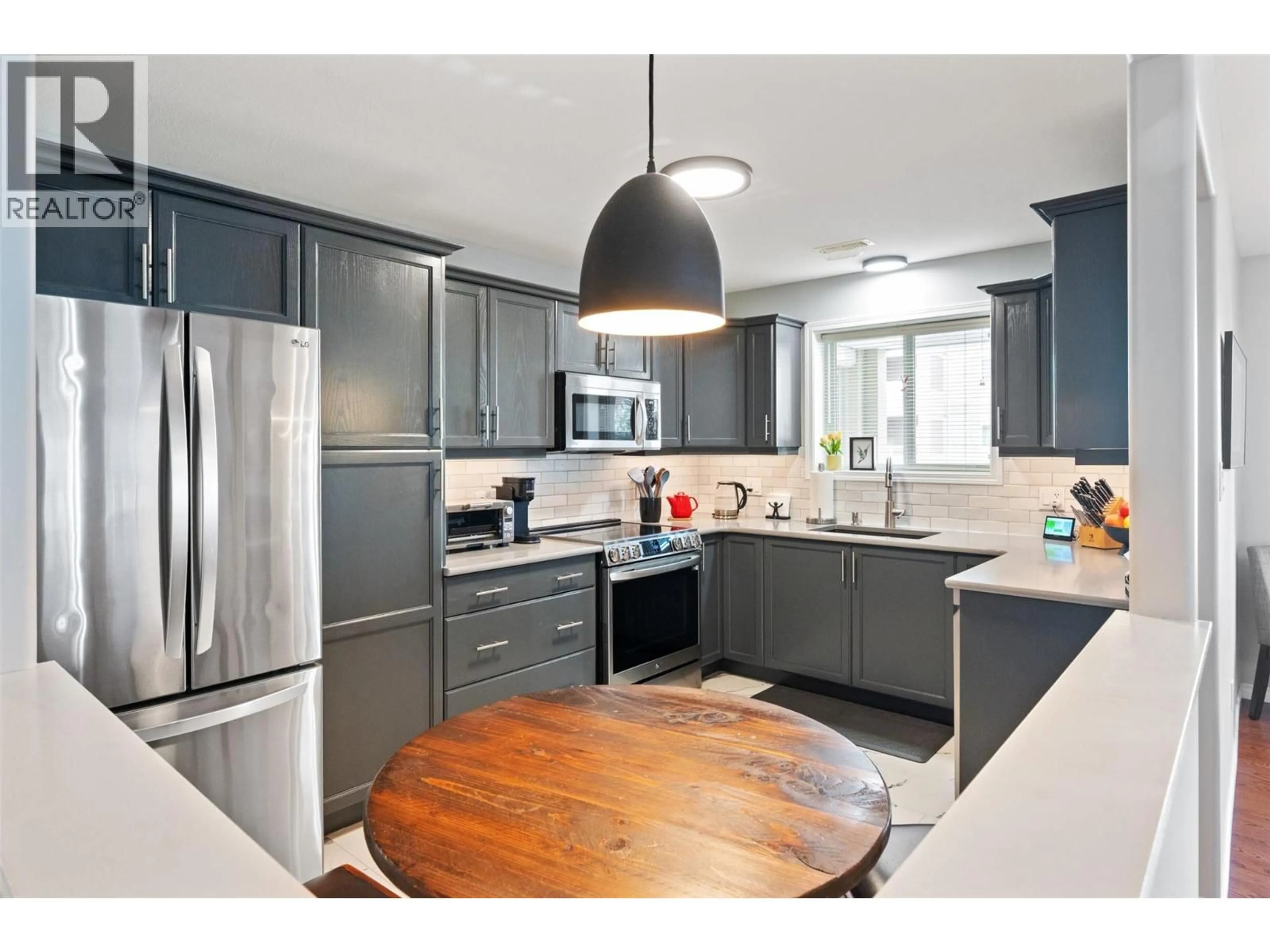 Open concept kitchen, unknown for 306 - 2285 ATKINSON STREET, Penticton British Columbia V2A8R7