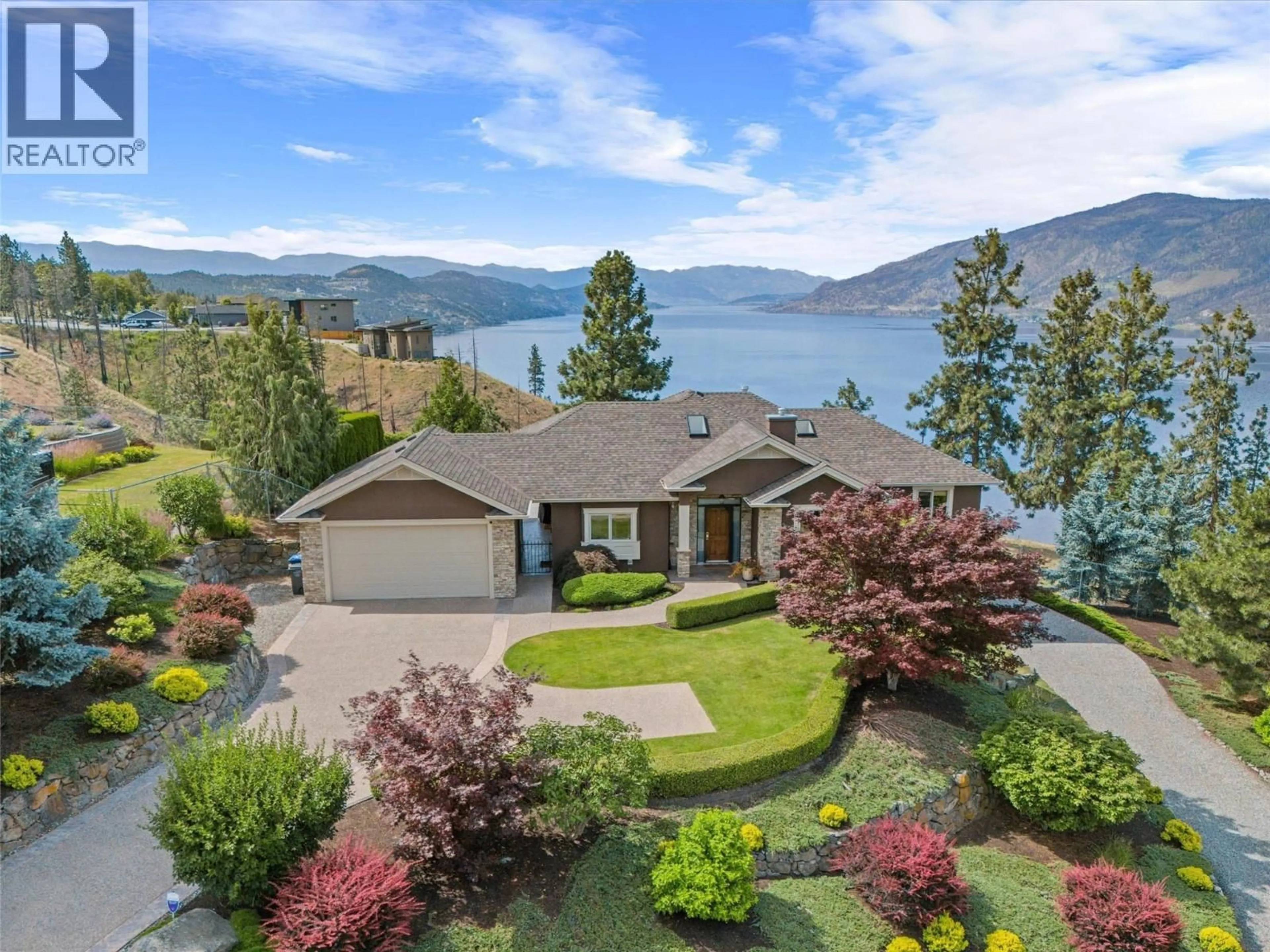 A pic from outside/outdoor area/front of a property/back of a property/a pic from drone, water/lake/river/ocean view for 30 - 10726 NIGHTHAWK ROAD, Lake Country British Columbia V4V2K7