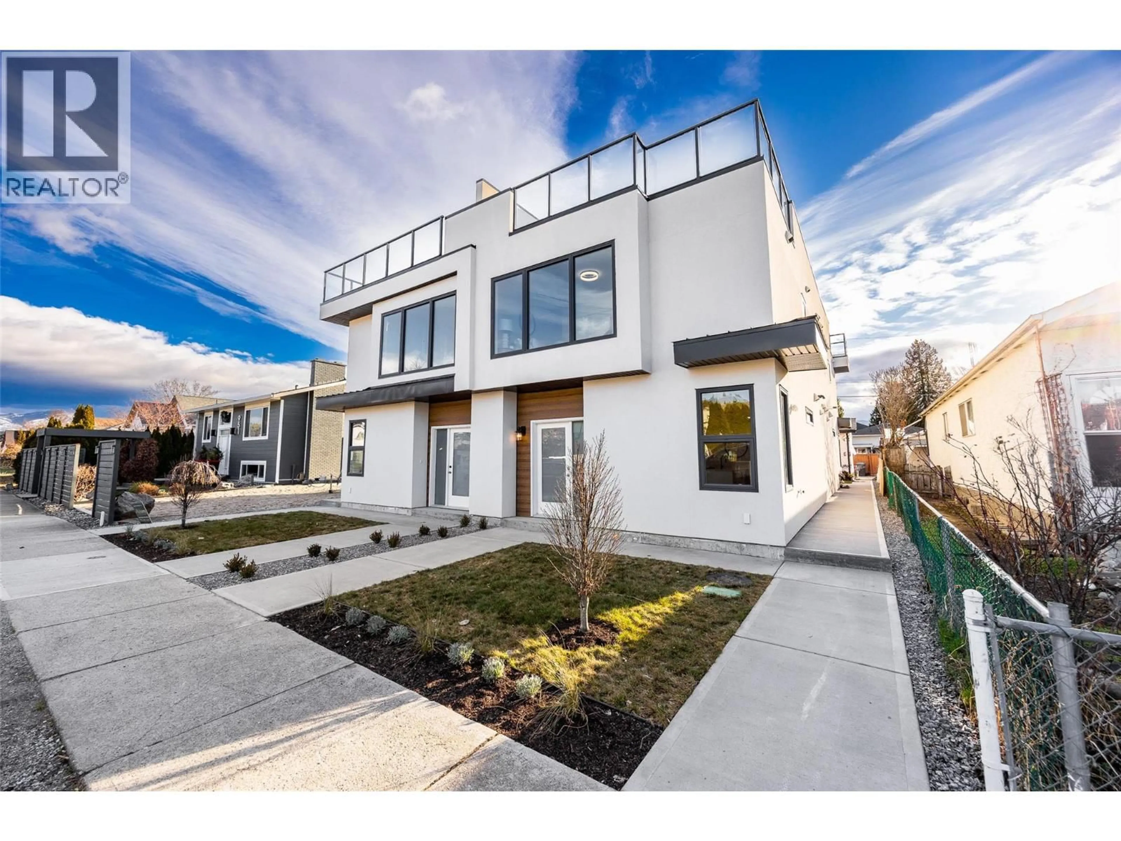 Home with brick exterior material, street for 2 - 943 FULLER AVENUE, Kelowna British Columbia V1Y6X5