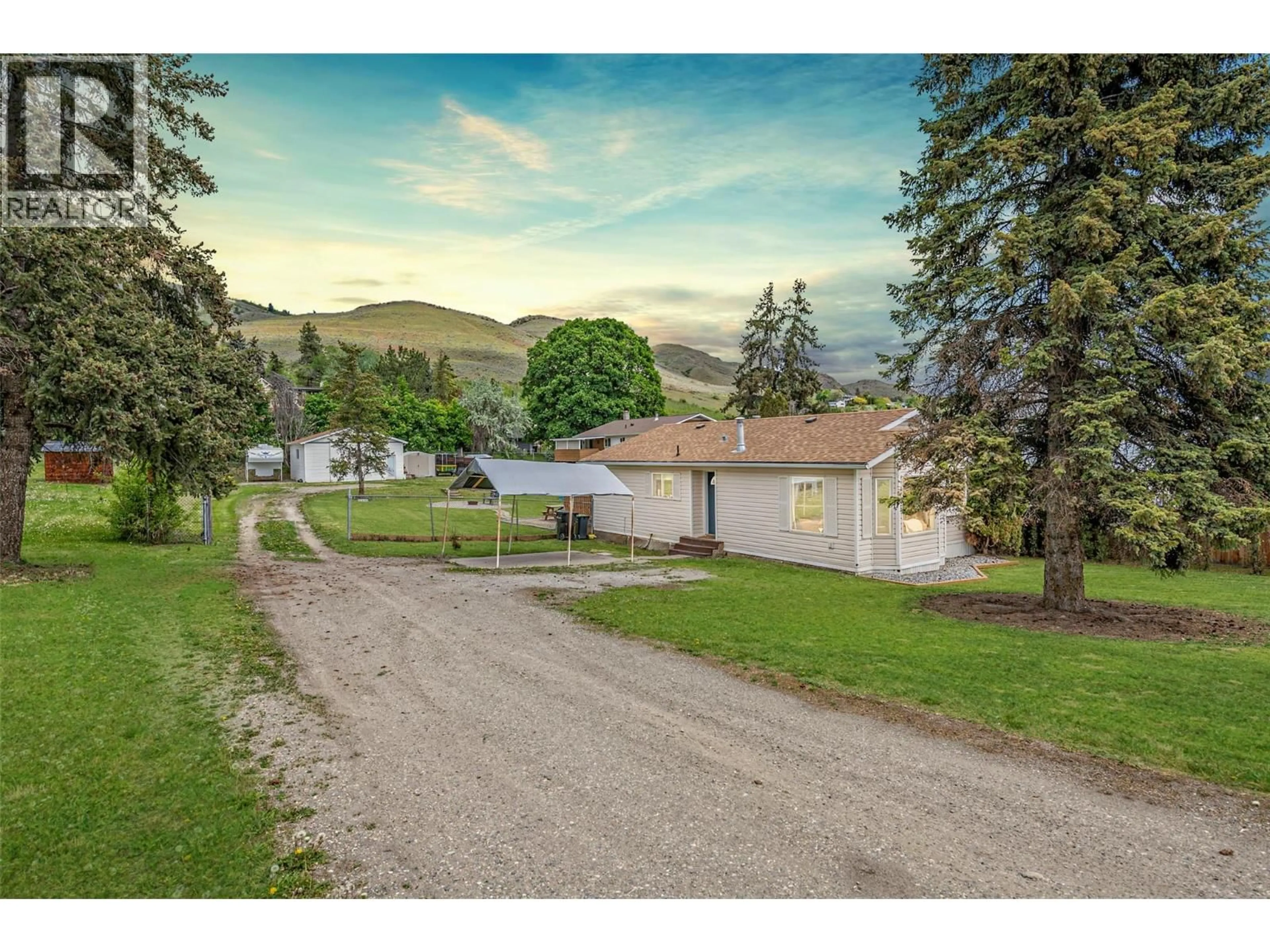 A pic from outside/outdoor area/front of a property/back of a property/a pic from drone, mountain view for 6111 BELLA VISTA ROAD, Vernon British Columbia V1H1B4