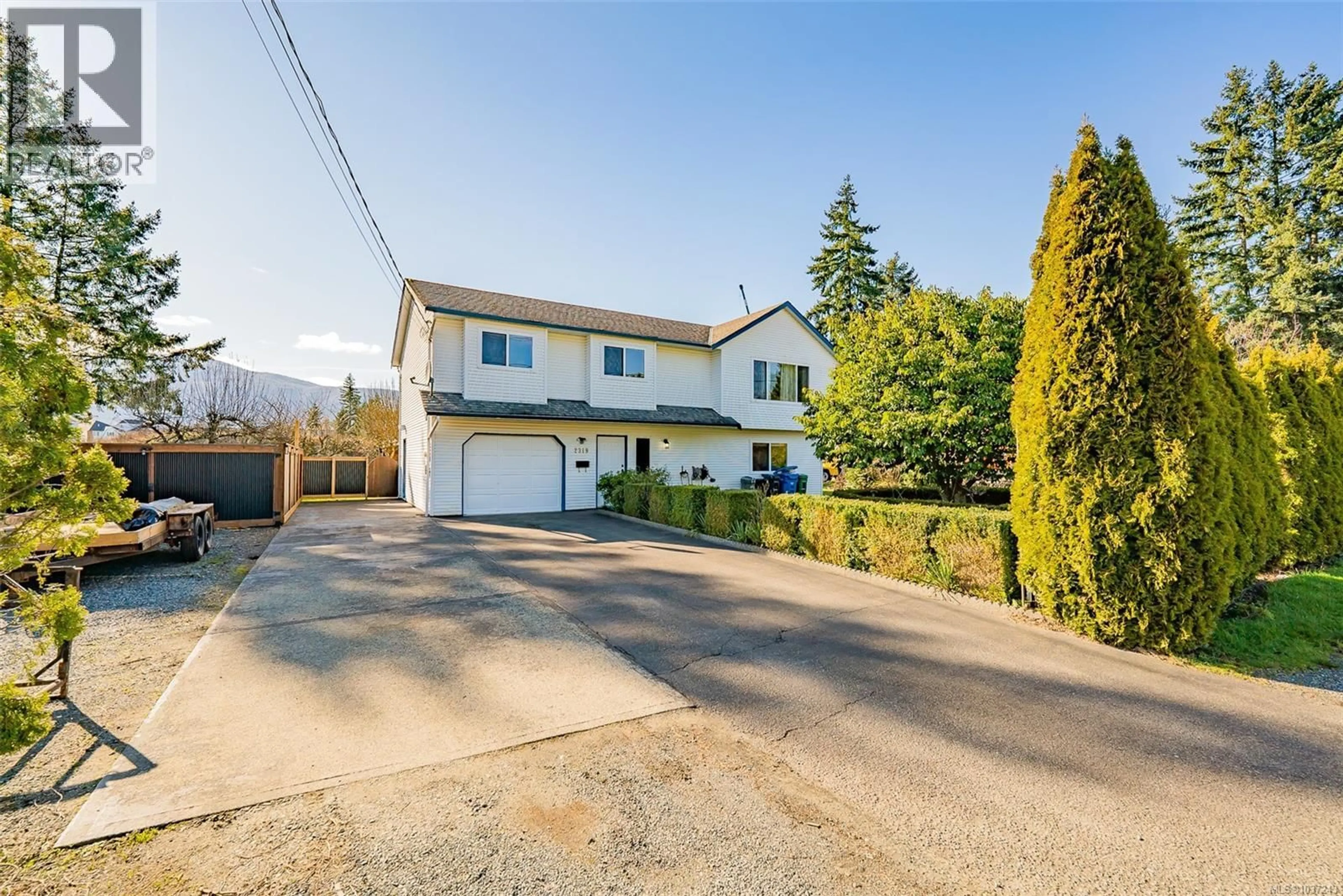 A pic from outside/outdoor area/front of a property/back of a property/a pic from drone, street for 2319 ROSSTOWN ROAD, Nanaimo British Columbia V9T3R4