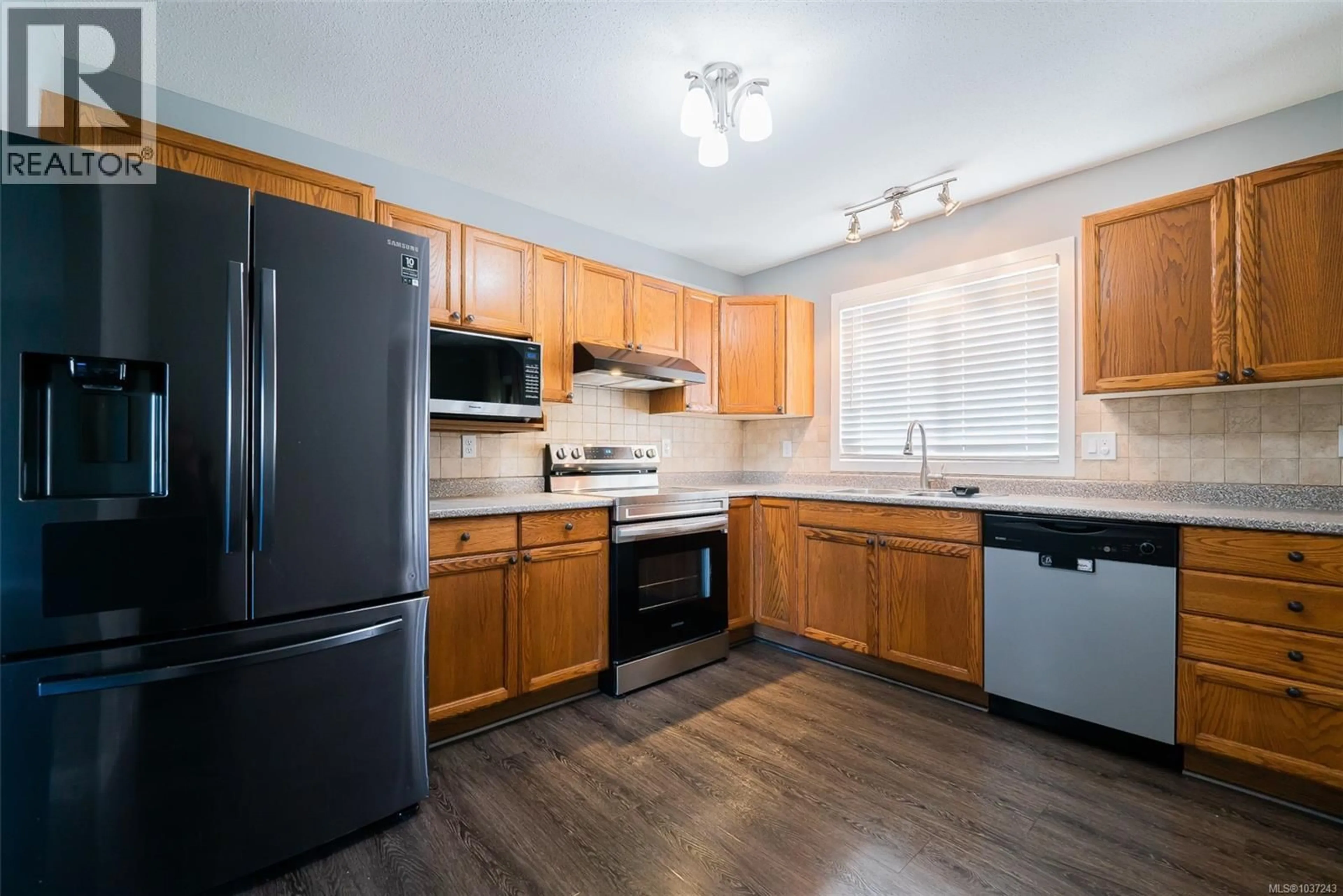 Standard kitchen, wood/laminate floor for 2319 ROSSTOWN ROAD, Nanaimo British Columbia V9T3R4