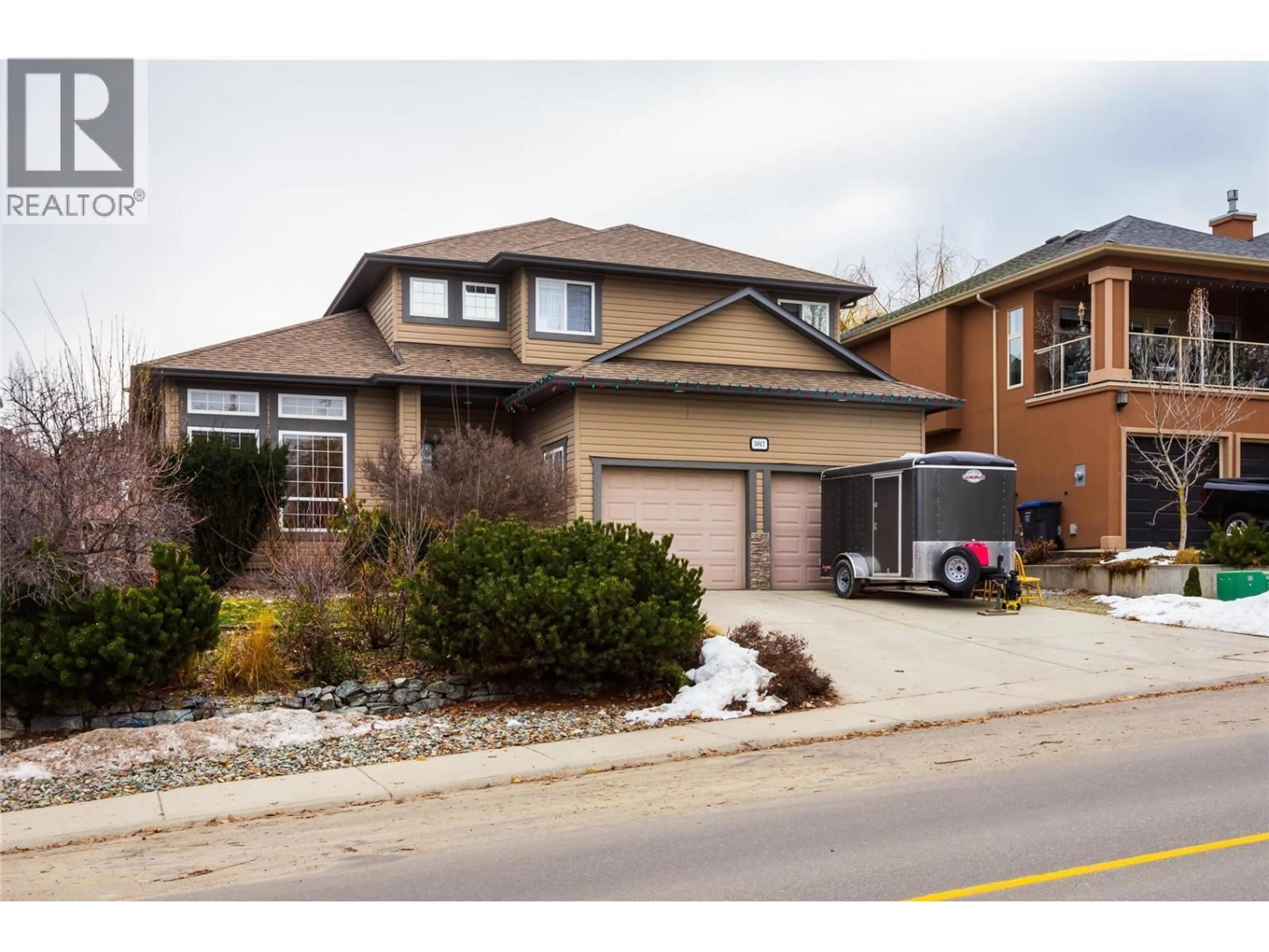 Home with brick exterior material, street for 5017 KILLDEER ROAD, Kelowna British Columbia V1W4M4