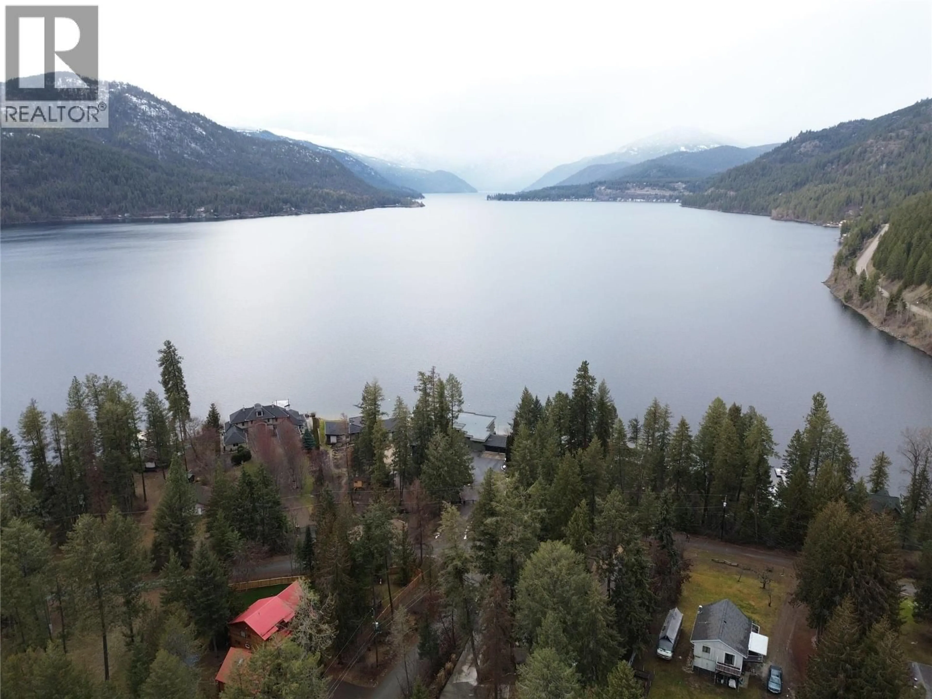 A pic from outside/outdoor area/front of a property/back of a property/a pic from drone, water/lake/river/ocean view for 39 WILKENSON ROAD, Christina Lake British Columbia V0H1E2