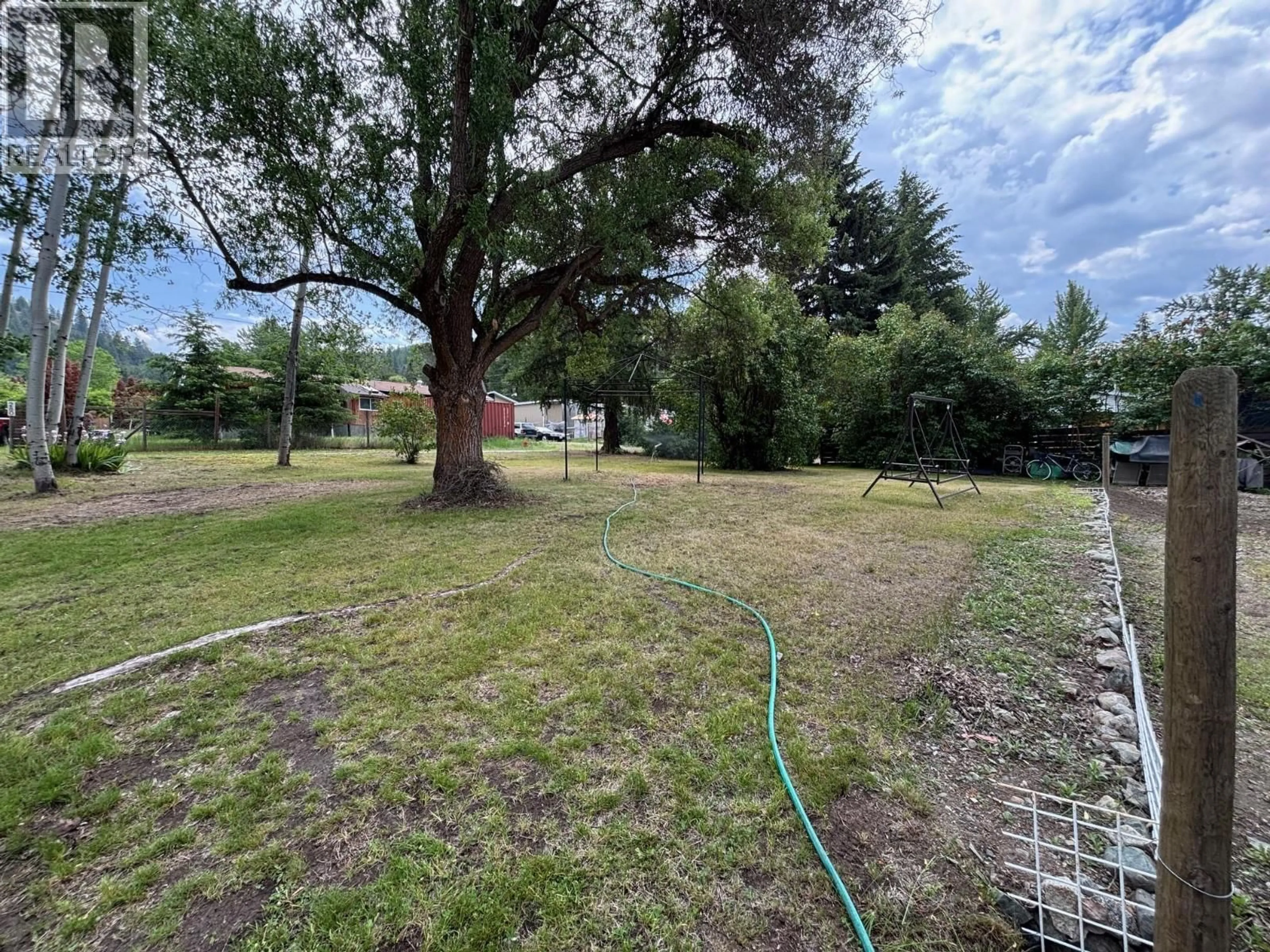 A pic from outside/outdoor area/front of a property/back of a property/a pic from drone, forest/trees view for 360 3RD STREET, Greenwood British Columbia V0H1J0