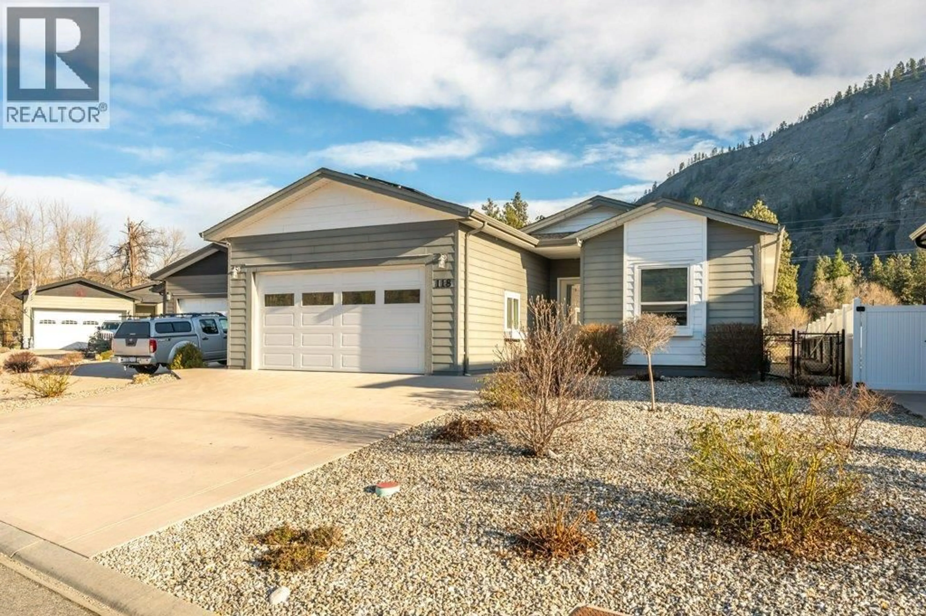 Home with vinyl exterior material, street for 118 - 8300 GALLAGHER LAKE FRONTAGE ROAD, Oliver British Columbia V0H1T2
