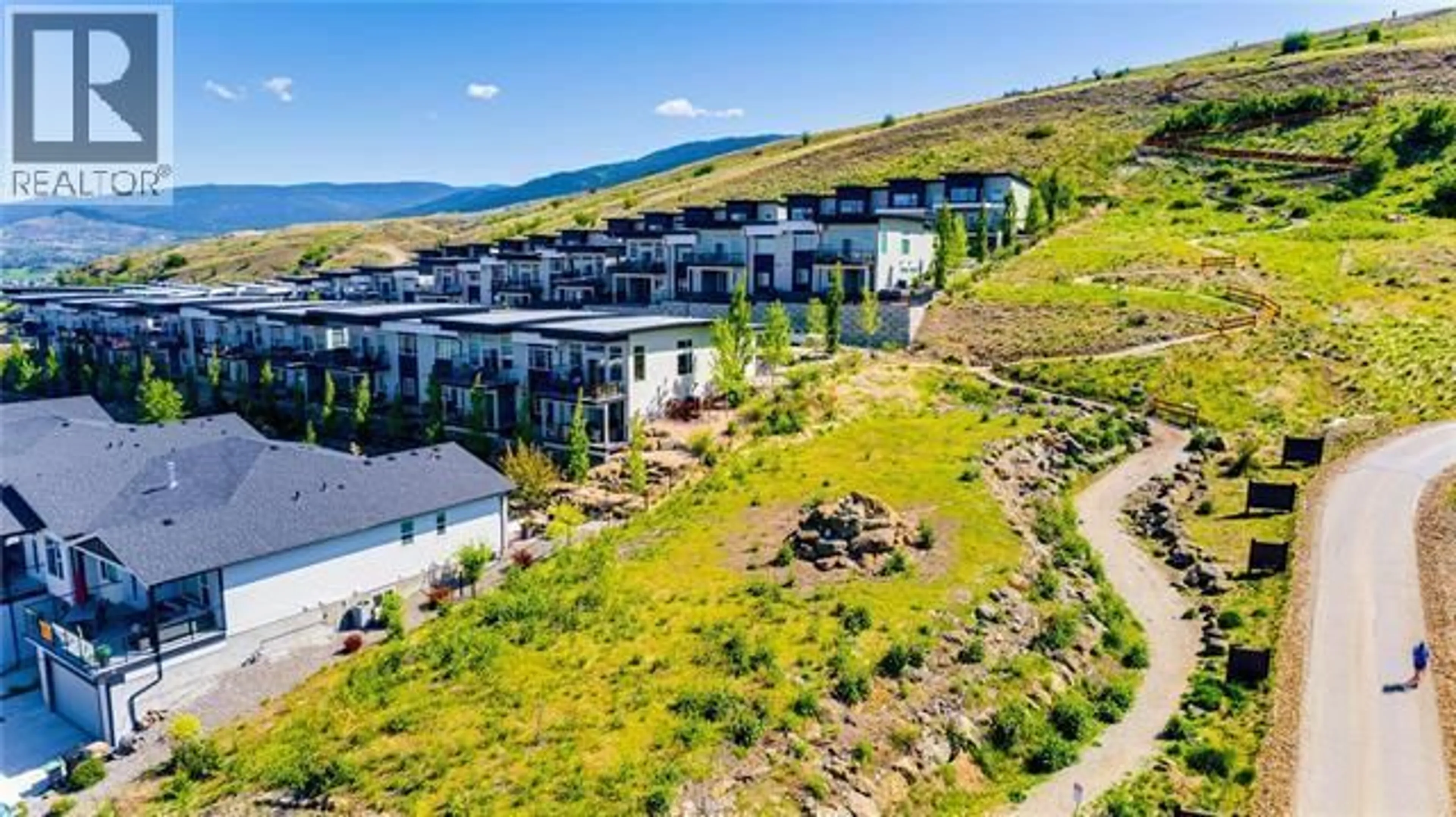 A pic from outside/outdoor area/front of a property/back of a property/a pic from drone, mountain view for 18 - 1000 MT. ROBSON PLACE, Vernon British Columbia V1B4G2