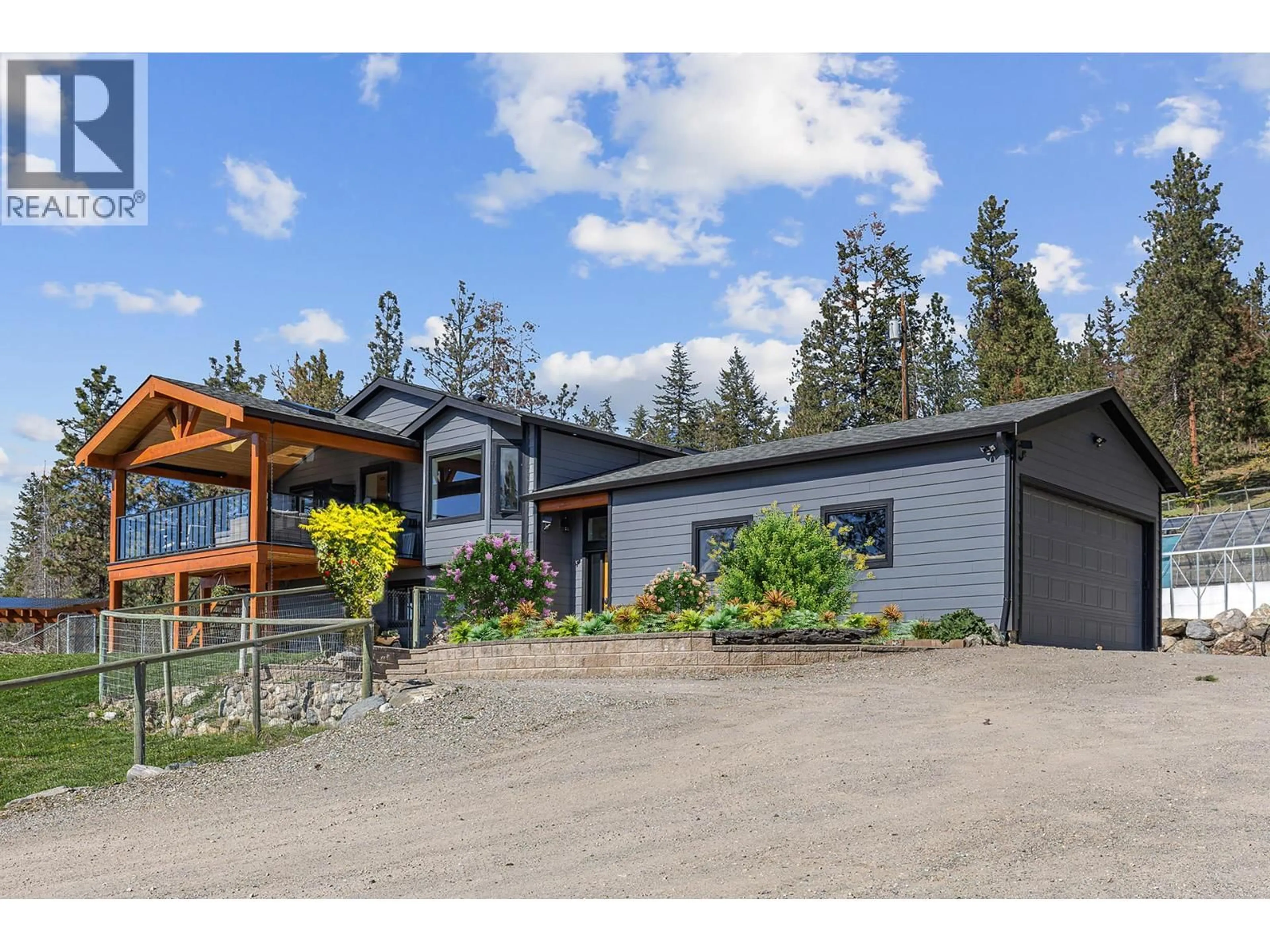 A pic from outside/outdoor area/front of a property/back of a property/a pic from drone, unknown for 6025 FARMERS DRIVE, Kelowna British Columbia V1P1A3