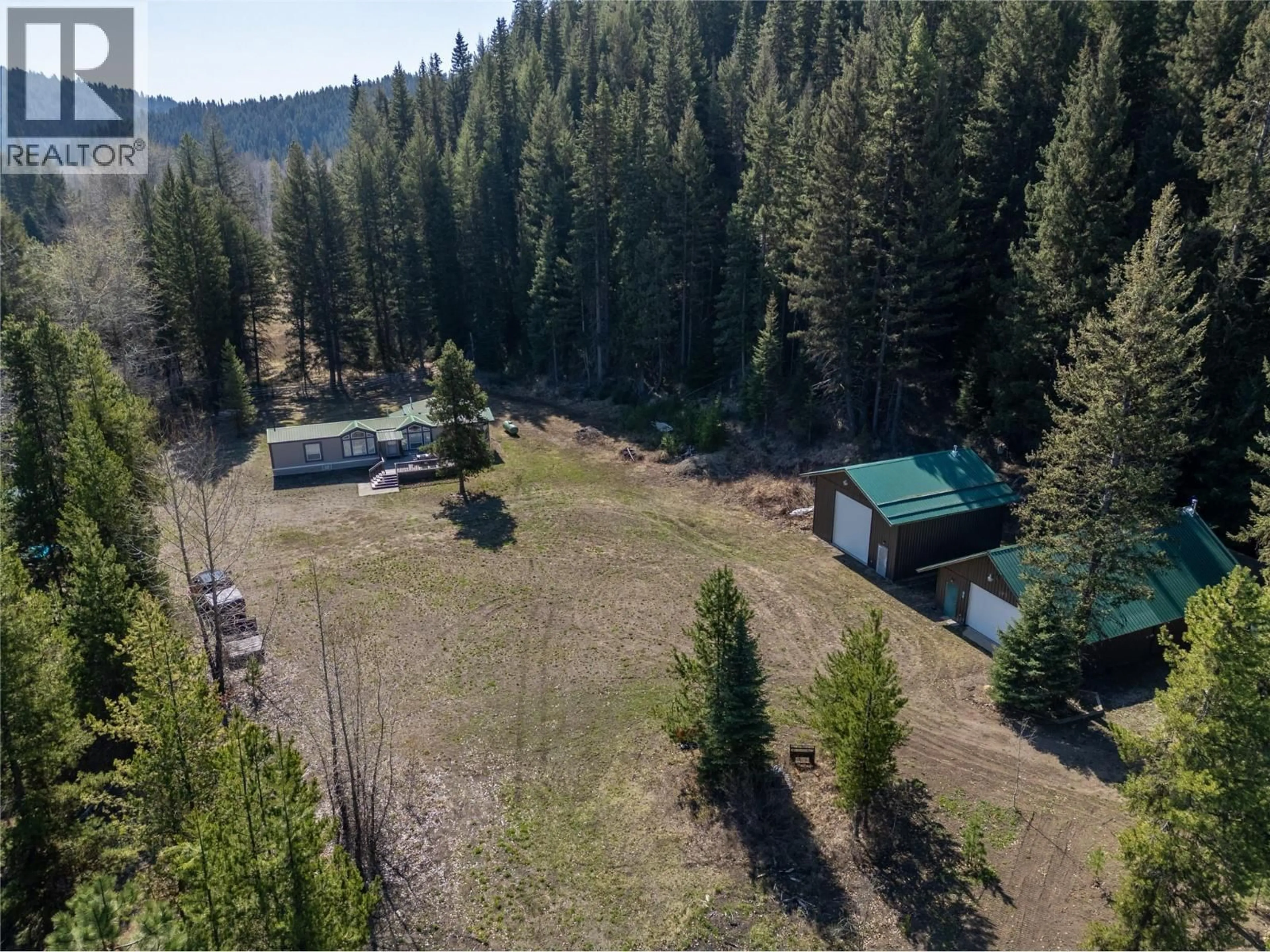 A pic from outside/outdoor area/front of a property/back of a property/a pic from drone, forest/trees view for 5633S COLDWATER ROAD, Merritt British Columbia V0X2L0