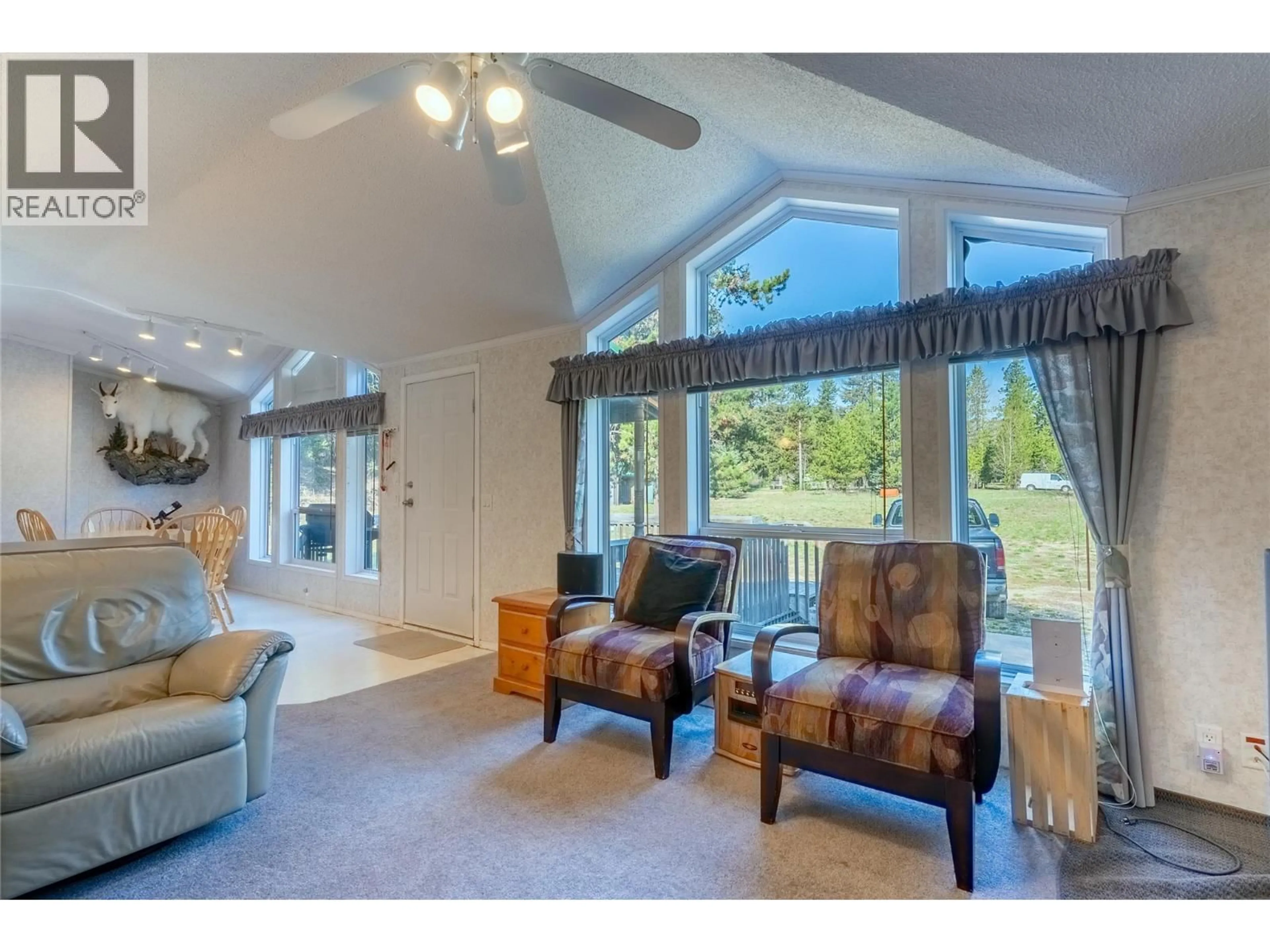 Living room with furniture, unknown for 5633S COLDWATER ROAD, Merritt British Columbia V0X2L0