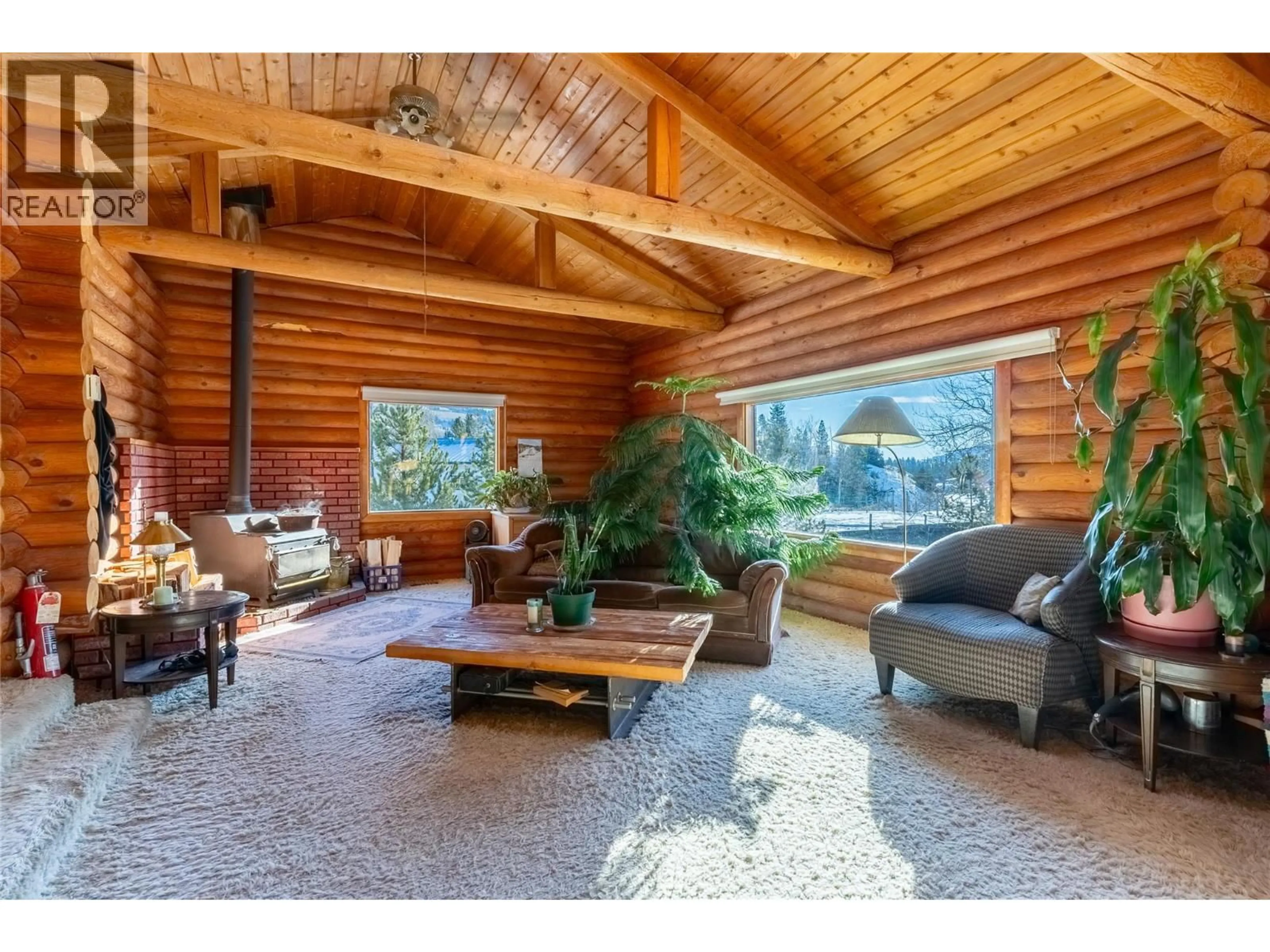 Living room with furniture, wood/laminate floor for 6805 FOLEY ROAD, Logan Lake British Columbia V0K1W0