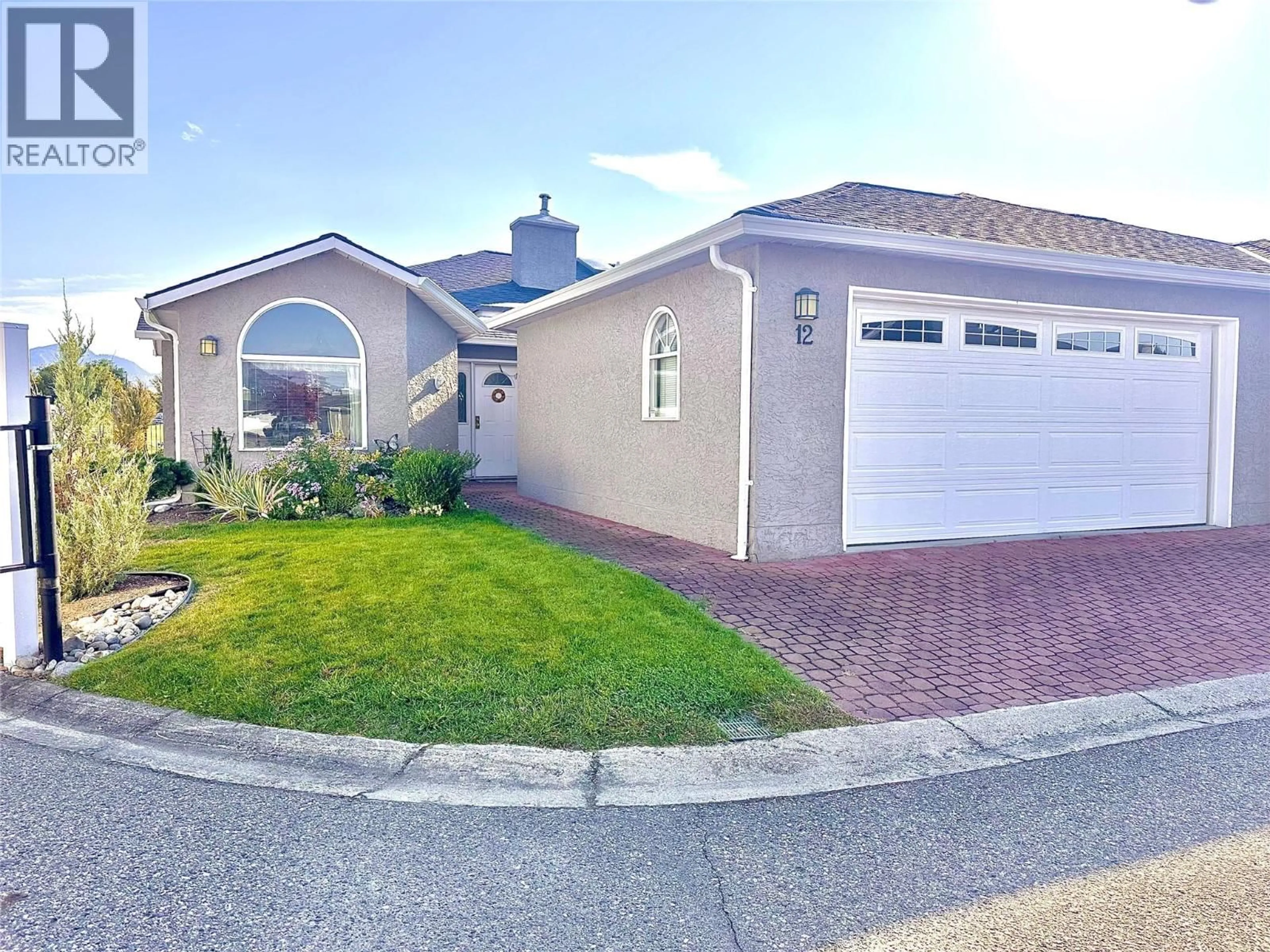 Home with vinyl exterior material, street for 12 - 1020 LANFRANCO ROAD, Kelowna British Columbia V1W3W6