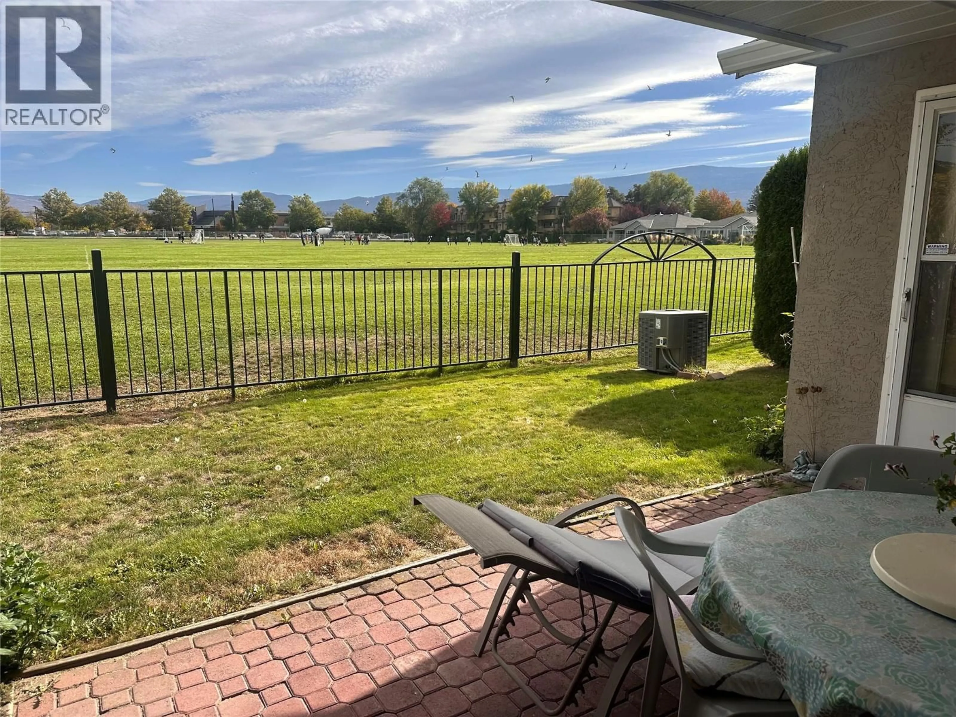 A pic from outside/outdoor area/front of a property/back of a property/a pic from drone, water/lake/river/ocean view for 12 - 1020 LANFRANCO ROAD, Kelowna British Columbia V1W3W6