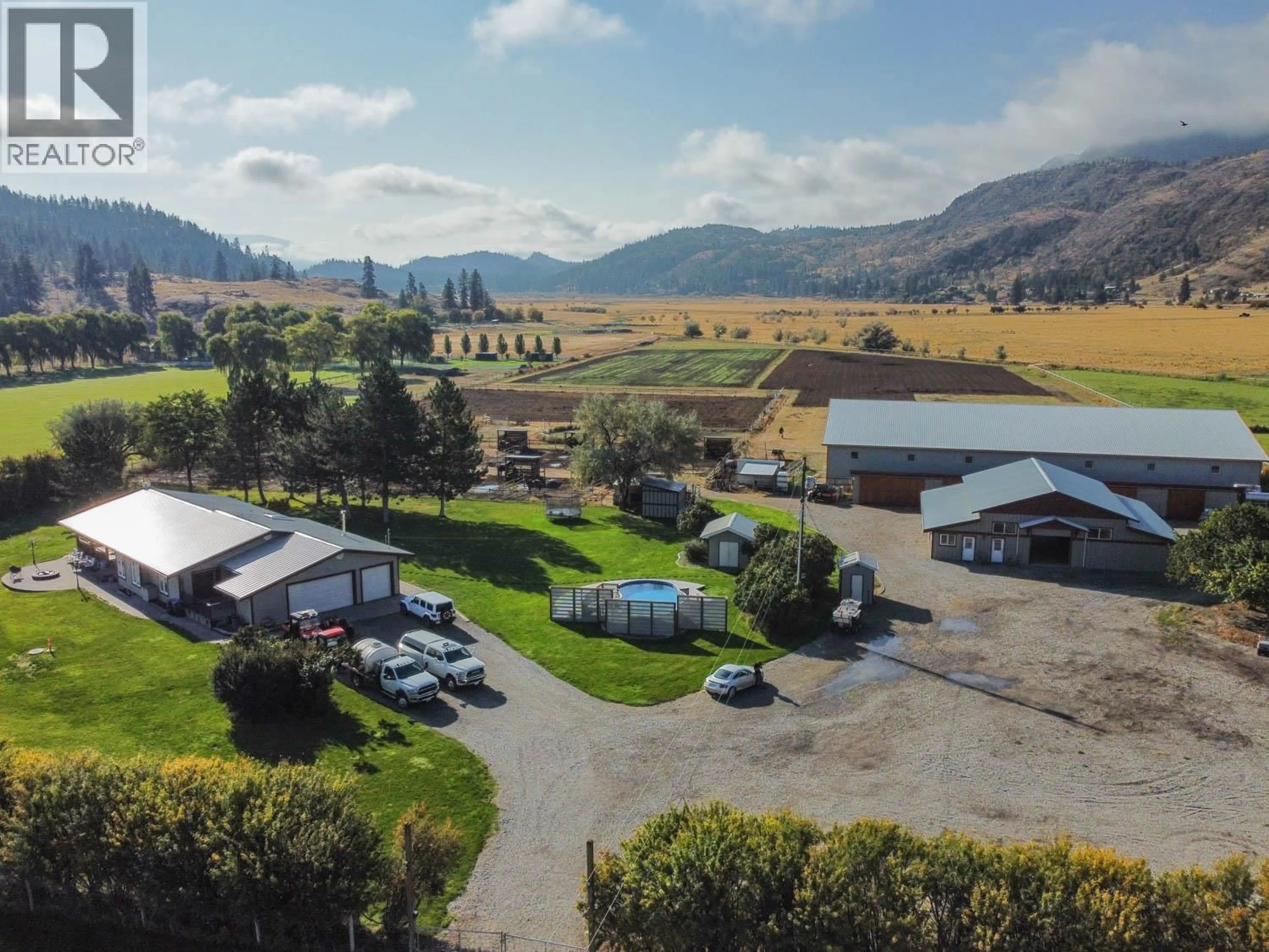 A pic from outside/outdoor area/front of a property/back of a property/a pic from drone, mountain view for 300 JONES WAY ROAD, Oliver British Columbia V0H1T5