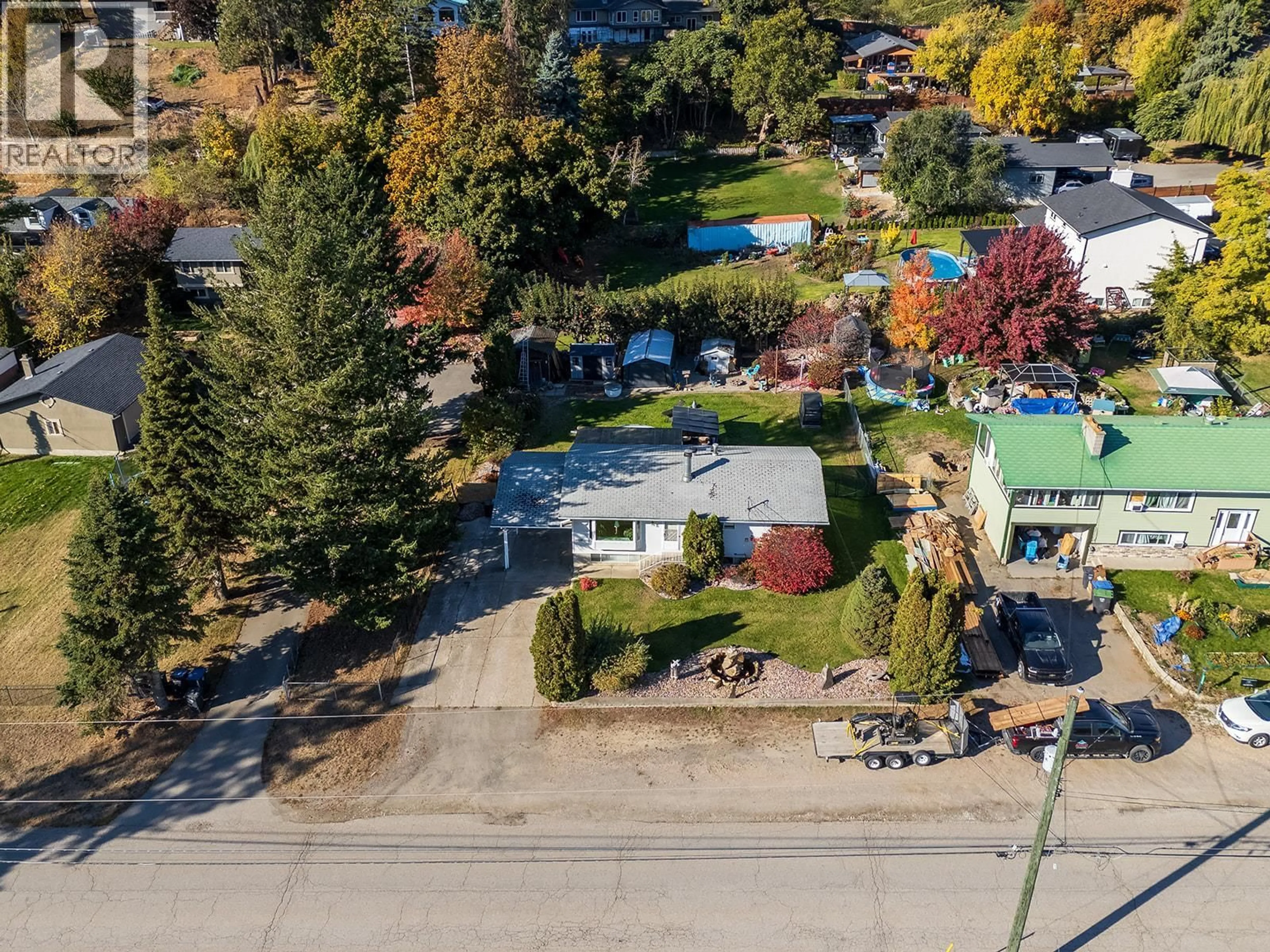 A pic from outside/outdoor area/front of a property/back of a property/a pic from drone, street for 10350 CHASE ROAD, Lake Country British Columbia V4V1K7