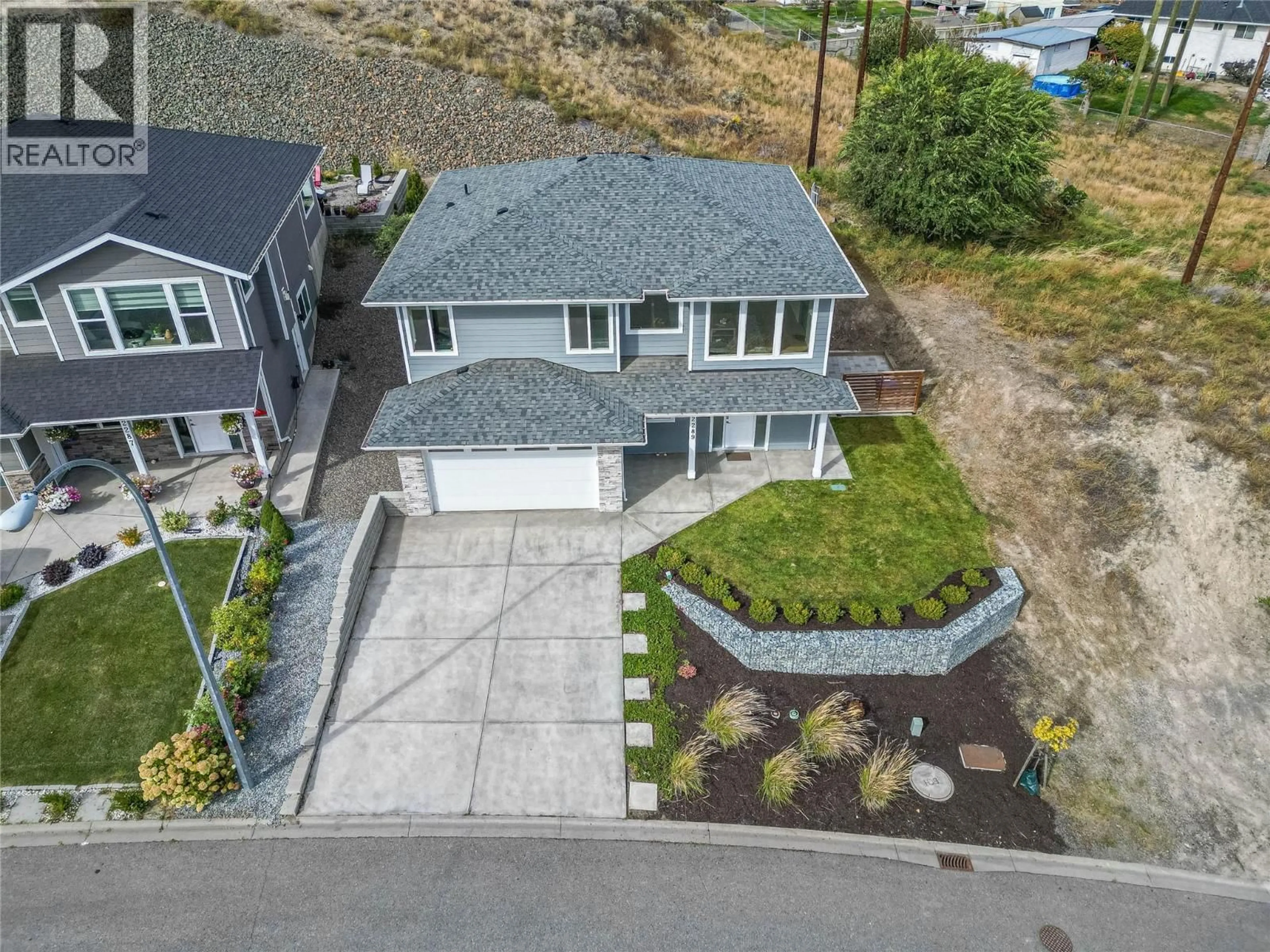 A pic from outside/outdoor area/front of a property/back of a property/a pic from drone, unknown for 2289 GRASSLANDS BOULEVARD, Kamloops British Columbia V2B0E3