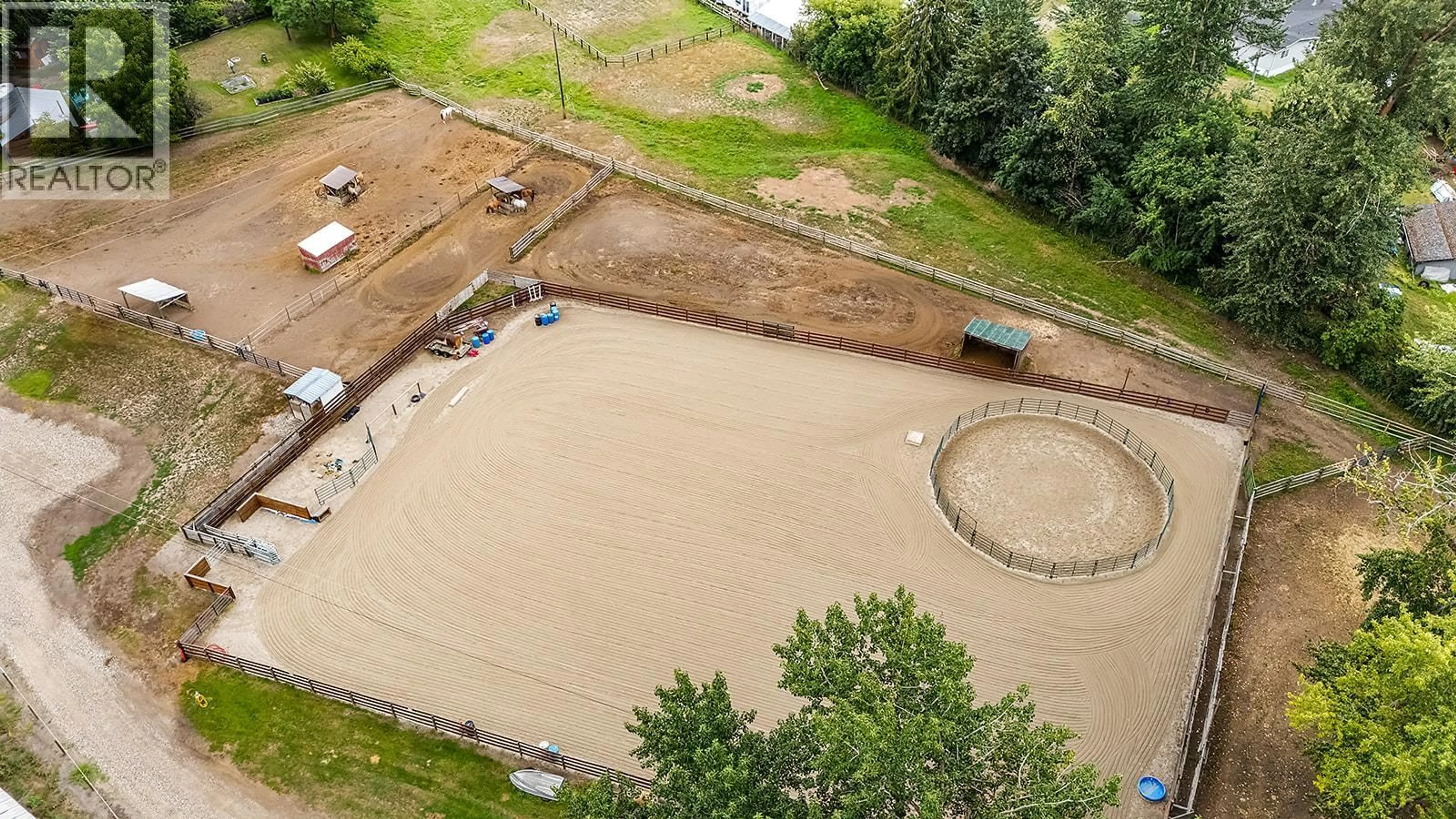 A pic from outside/outdoor area/front of a property/back of a property/a pic from drone, building for 1077 GOAT RIVER SOUTH ROAD, Creston British Columbia V0B1G1