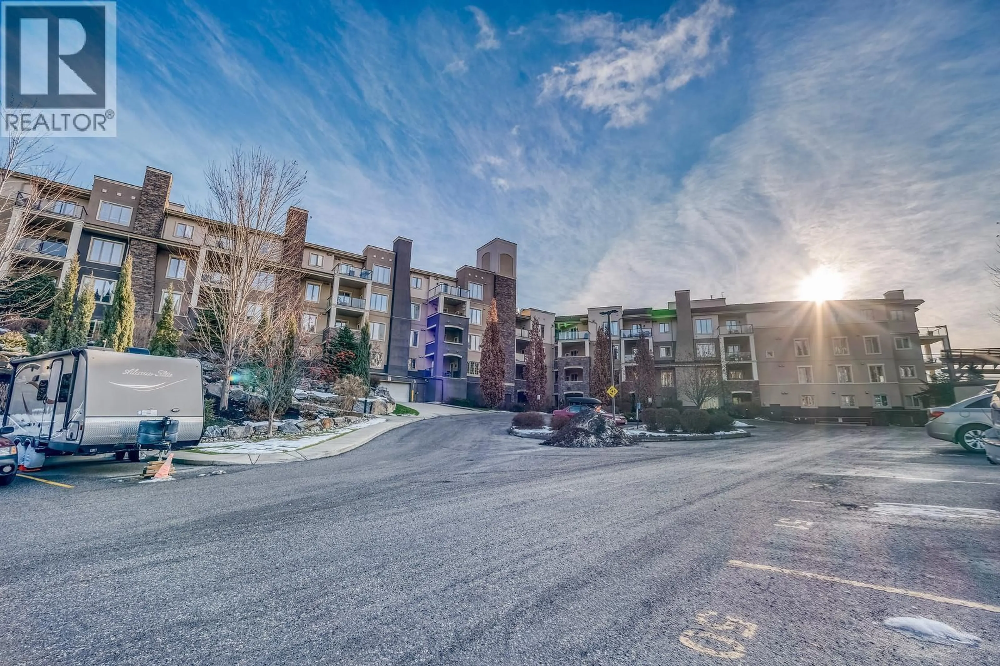 A pic from outside/outdoor area/front of a property/back of a property/a pic from drone, mountain view for 2305 - 1873 COUNTRY CLUB DRIVE, Kelowna British Columbia V1V2W6