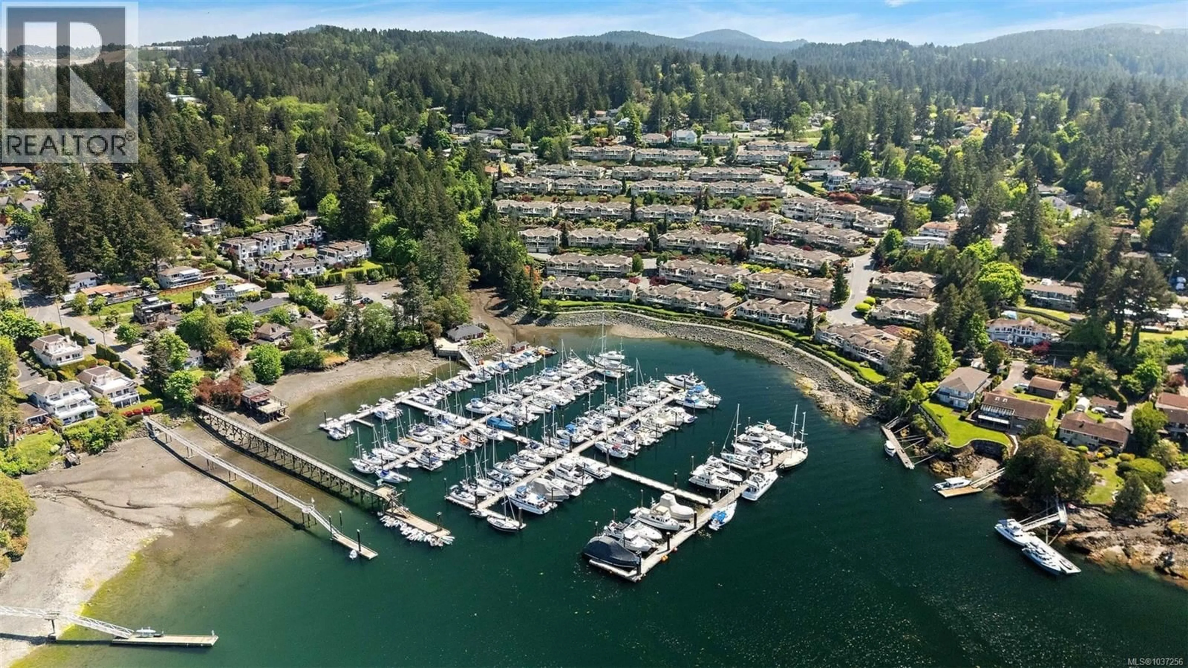 A pic from outside/outdoor area/front of a property/back of a property/a pic from drone, water/lake/river/ocean view for 702 - 6880 WALLACE DRIVE, Central Saanich British Columbia V8M1N8