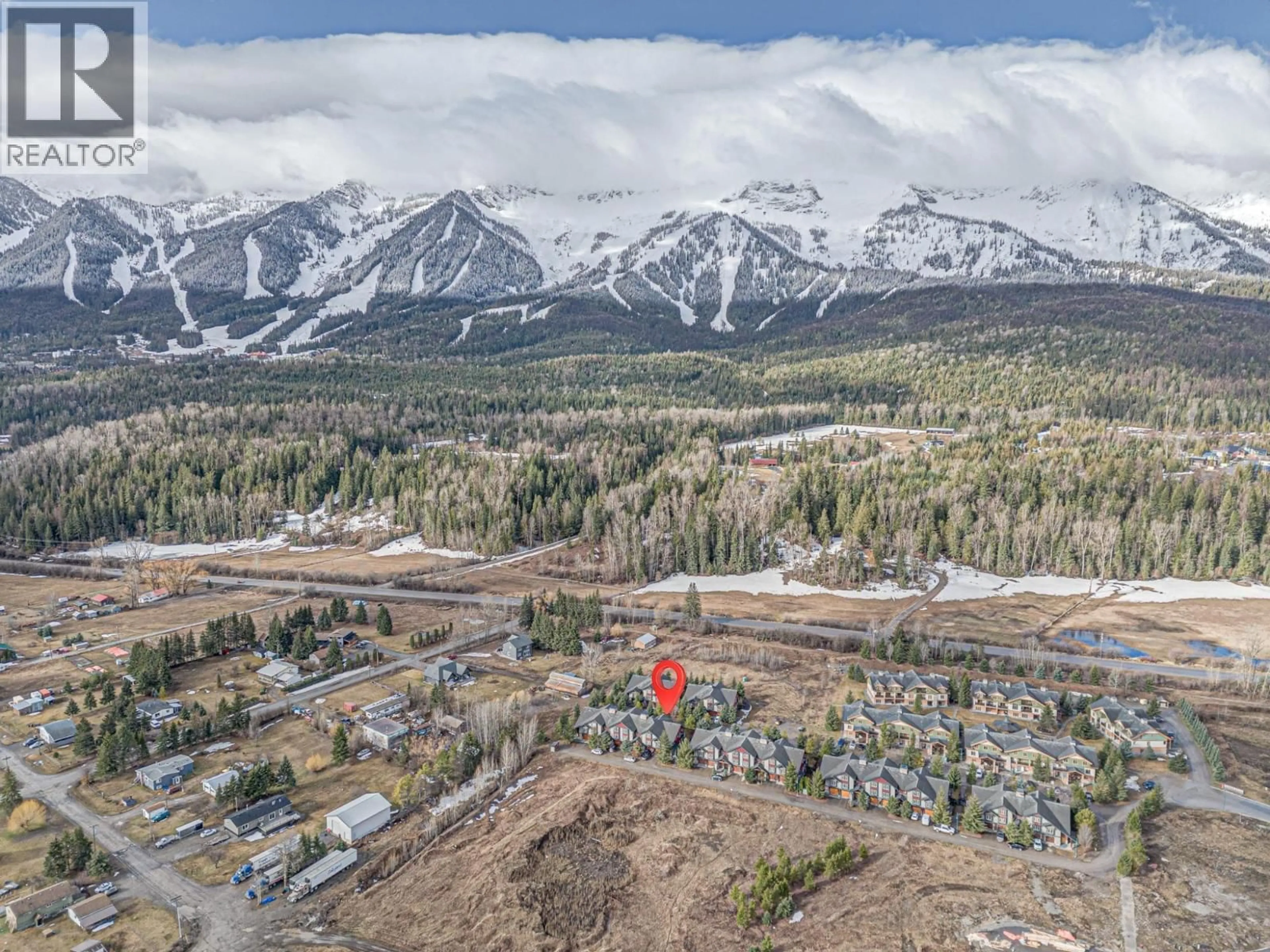 A pic from outside/outdoor area/front of a property/back of a property/a pic from drone, mountain view for 101A - 47 RIVERMOUNT PLACE, Fernie British Columbia V0B1M7