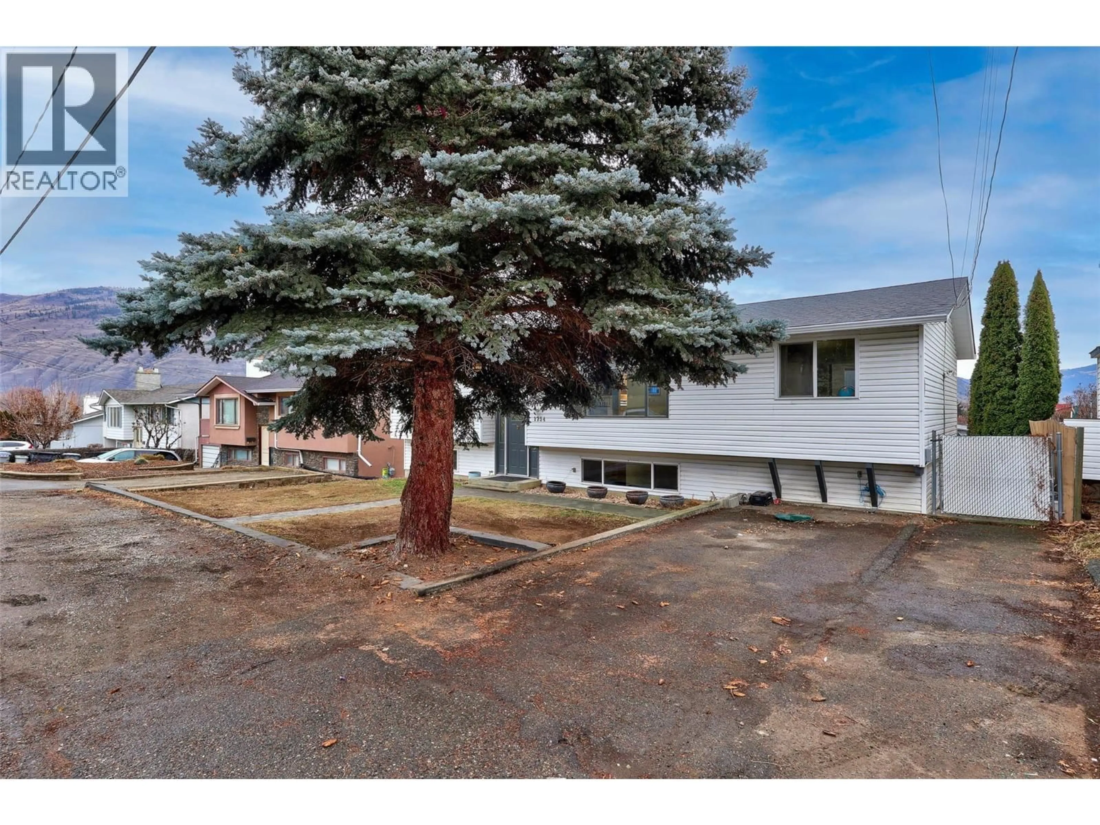 A pic from outside/outdoor area/front of a property/back of a property/a pic from drone, street for 1754 SHERIDAN DRIVE, Kamloops British Columbia V2B6A9