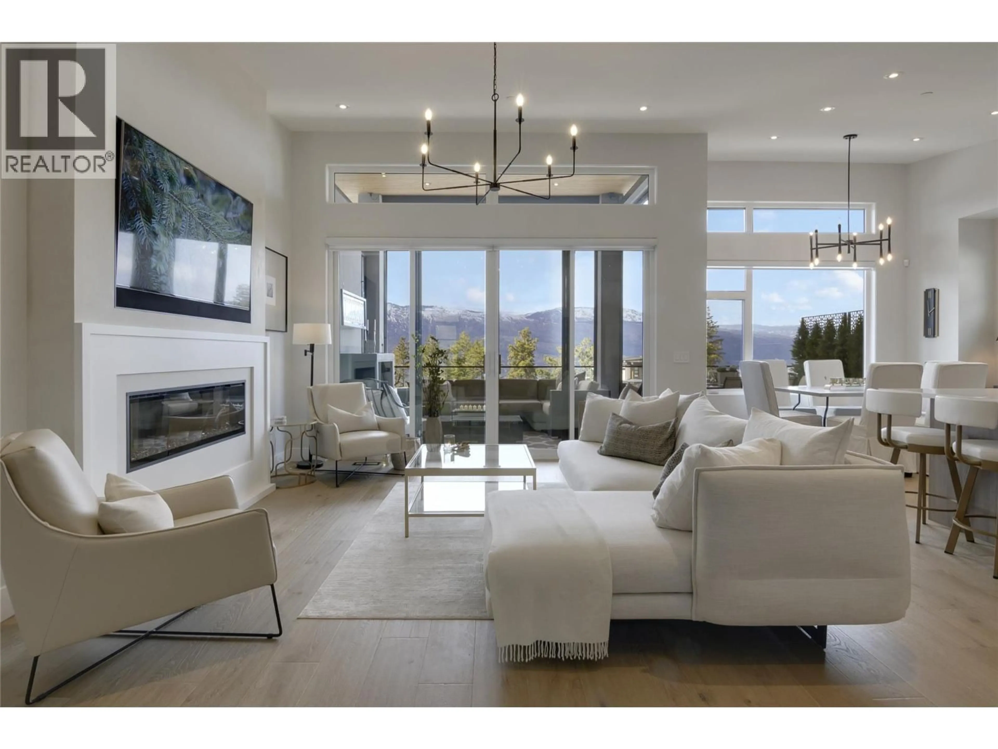 Living room with furniture, unknown for 9776 CENTRESTONE CRESCENT, Lake Country British Columbia V4V0A5