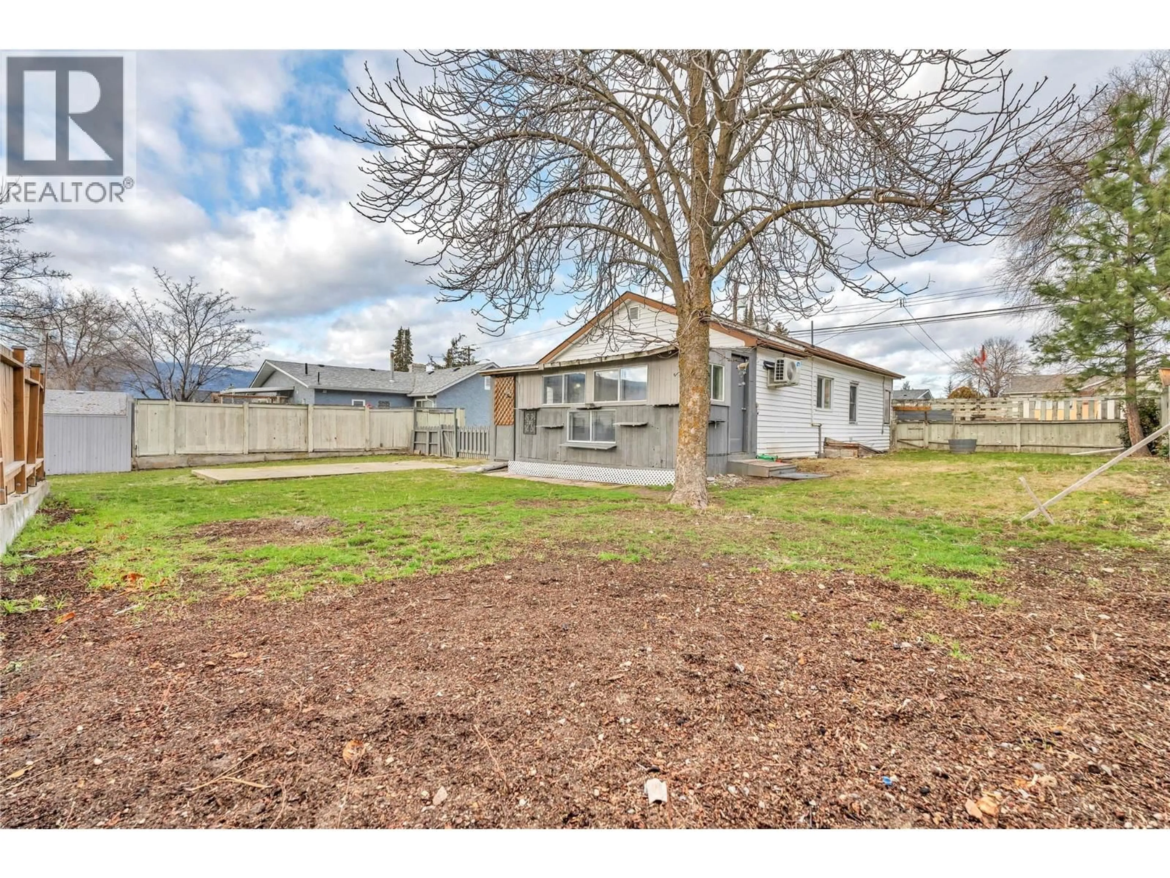 A pic from outside/outdoor area/front of a property/back of a property/a pic from drone, street for 1190 PENTICTON AVENUE, Penticton British Columbia V2A2N2