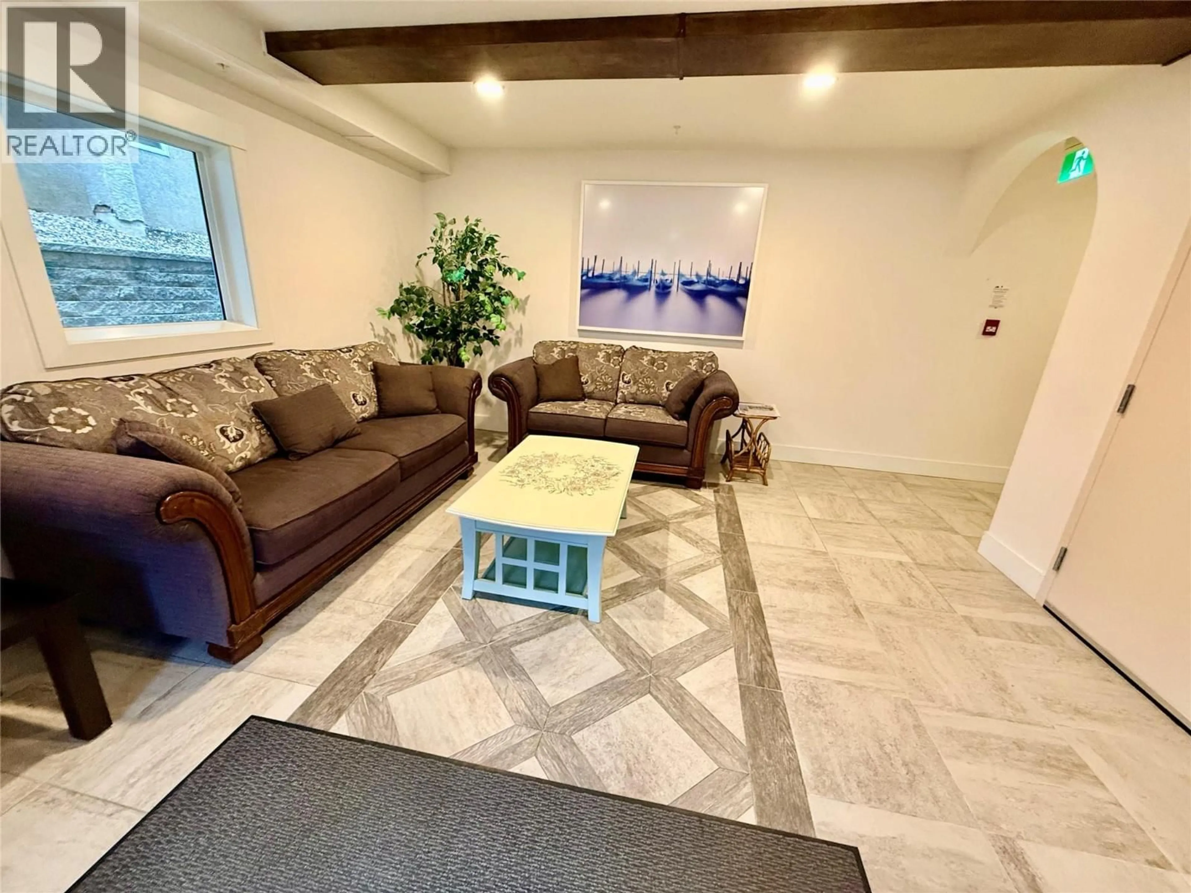 Living room with furniture, ceramic/tile floor for 403 - 330 4 AVENUE SOUTHEAST, Salmon Arm British Columbia V1E4G4