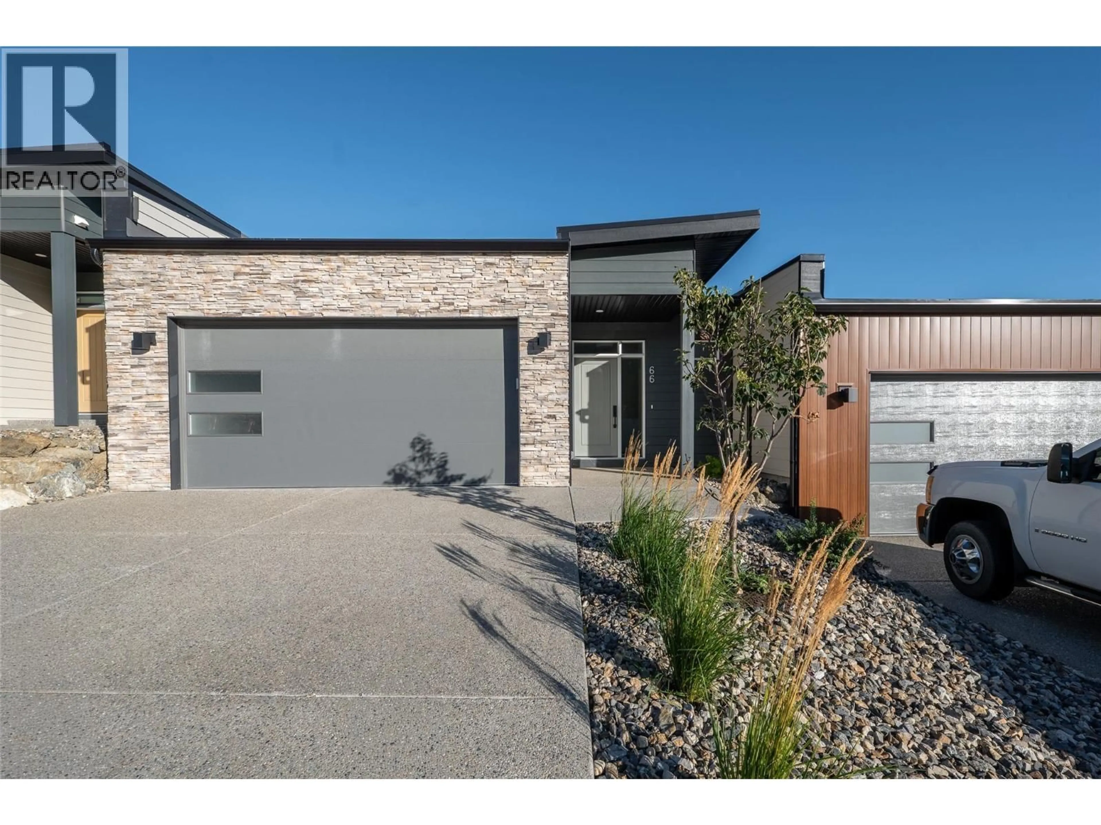 Home with brick exterior material, street for 68 - 7735 OKANAGAN HILLS BOULEVARD, Vernon British Columbia V1H0A7