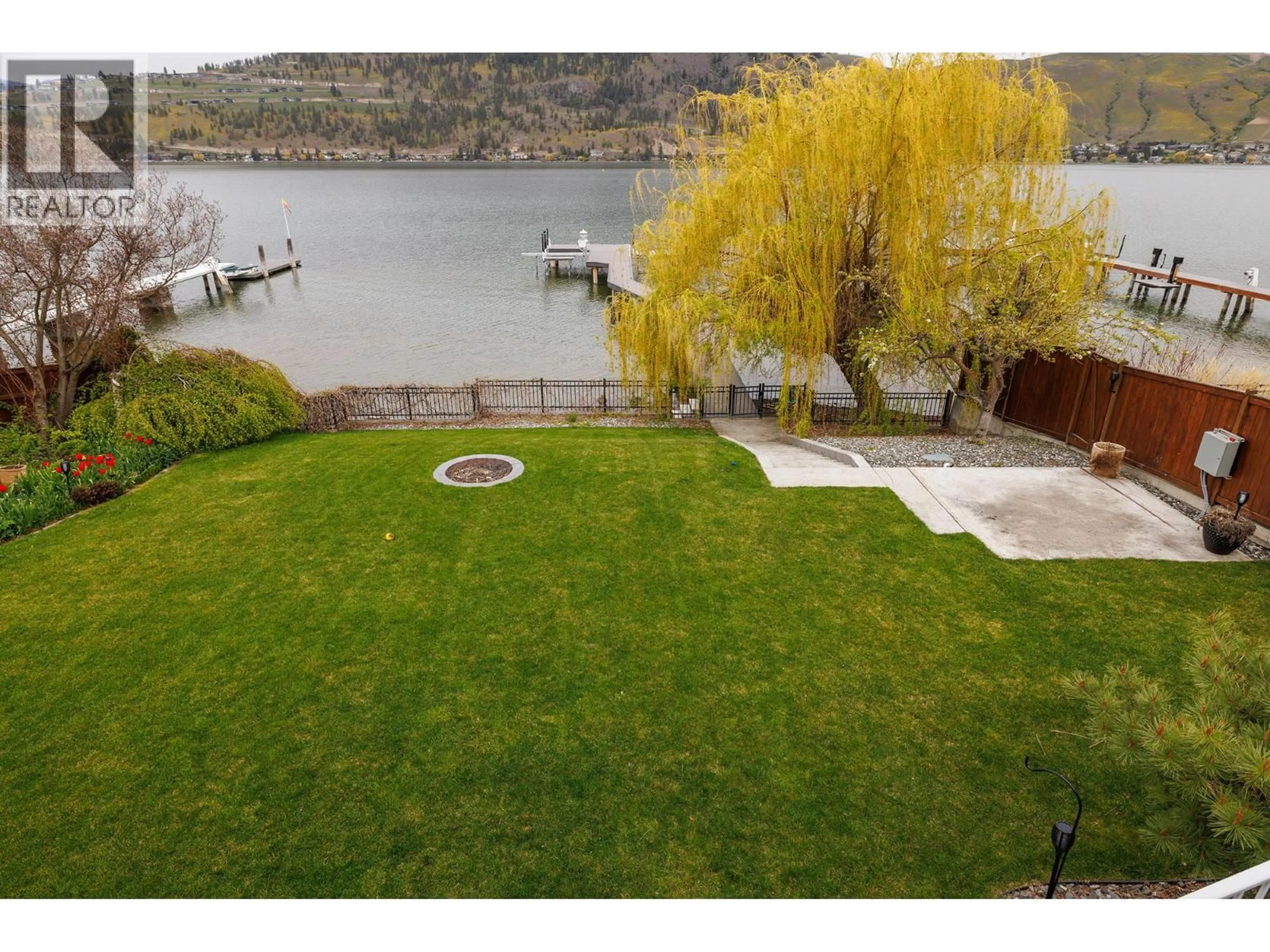 A pic from outside/outdoor area/front of a property/back of a property/a pic from drone, water/lake/river/ocean view for 8291 OKANAGAN LANDING ROAD, Vernon British Columbia V1H1J5