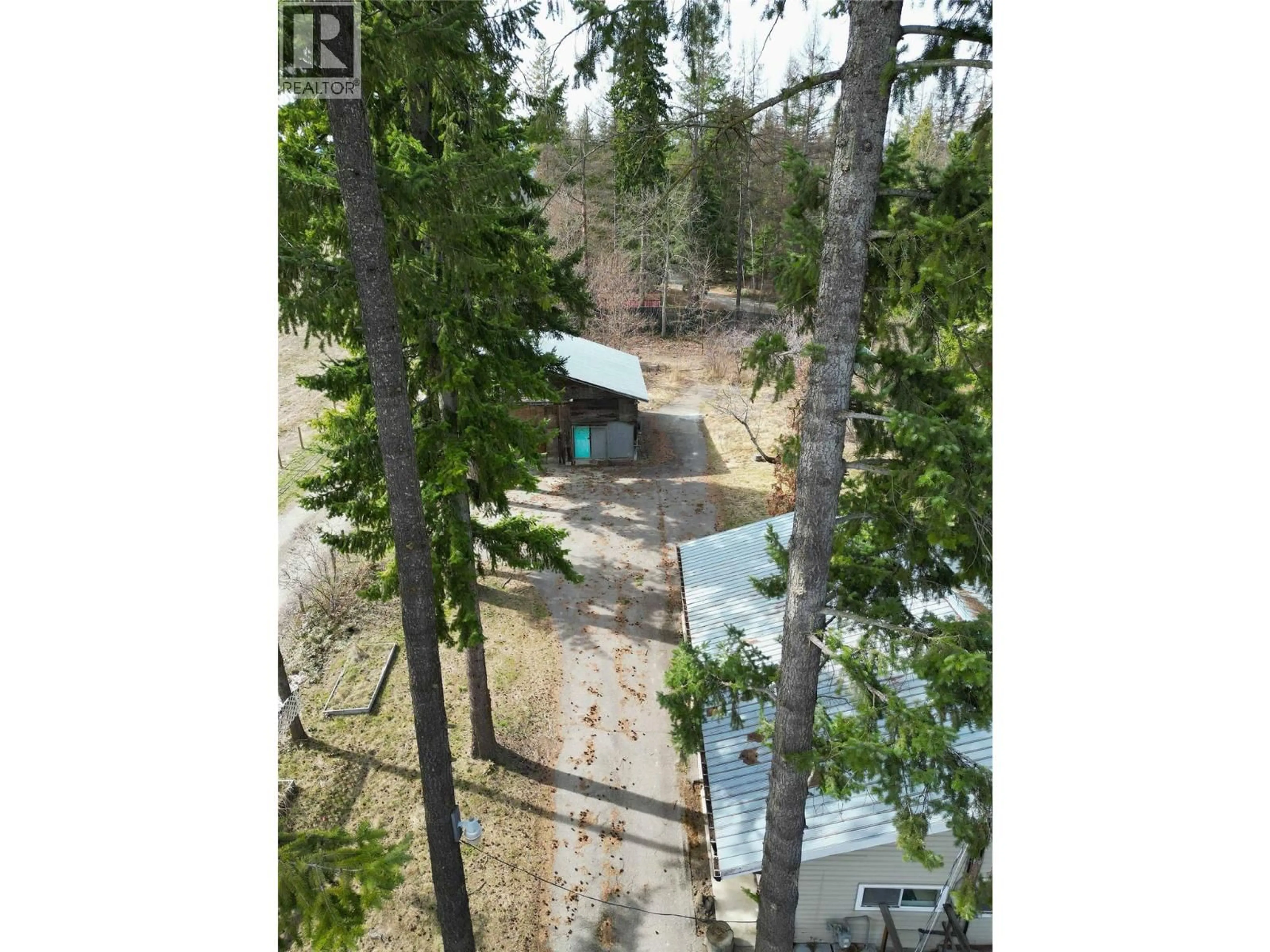 A pic from outside/outdoor area/front of a property/back of a property/a pic from drone, forest/trees view for 271 97 B HIGHWAY NORTHEAST, Salmon Arm British Columbia V1E1X5