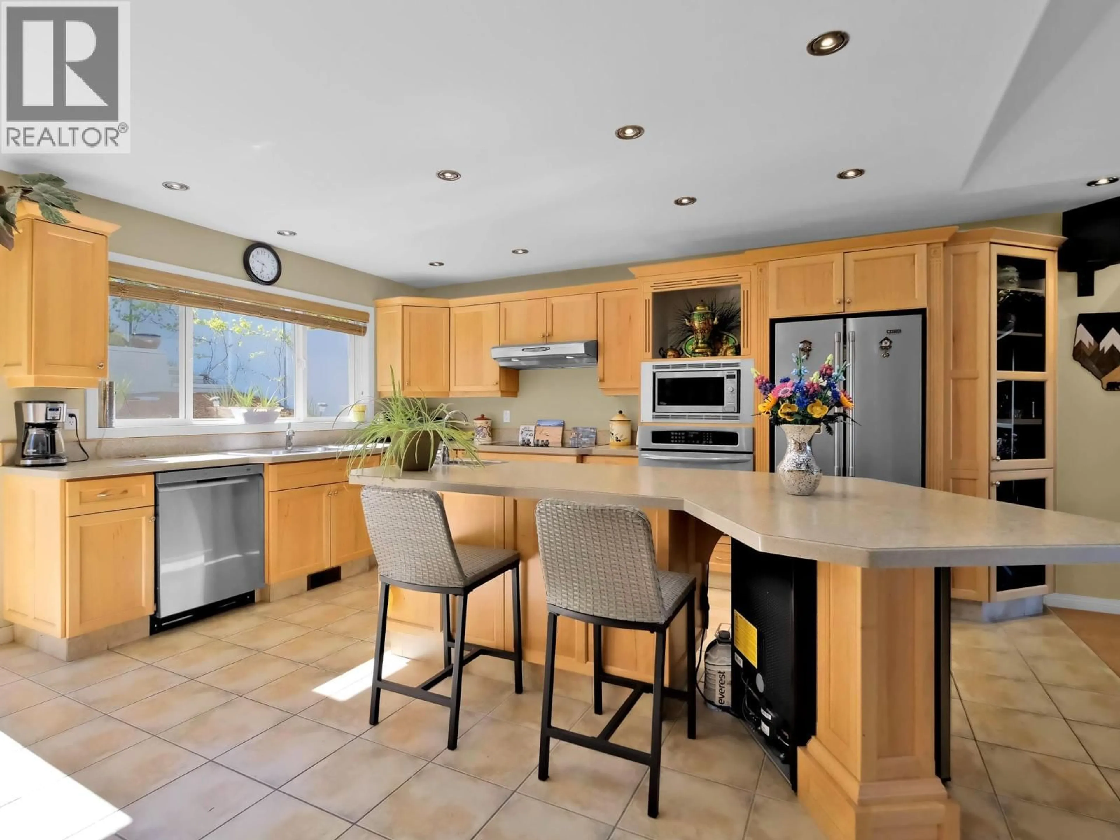 Contemporary kitchen, ceramic/tile floor for 102 - 695 PINEVIEW ROAD, Penticton British Columbia V2A7S8