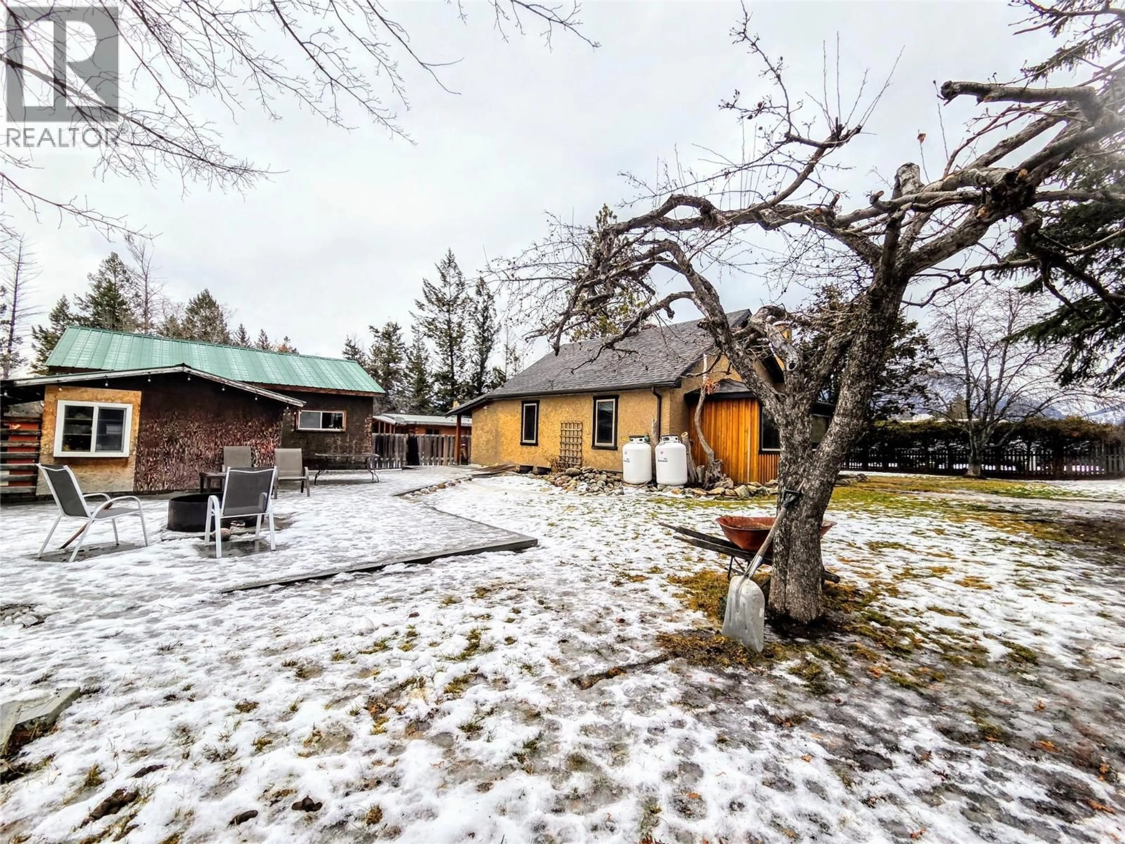 A pic from outside/outdoor area/front of a property/back of a property/a pic from drone, street for 9215 MOFFAT AVENUE, Invermere British Columbia V0A1K5
