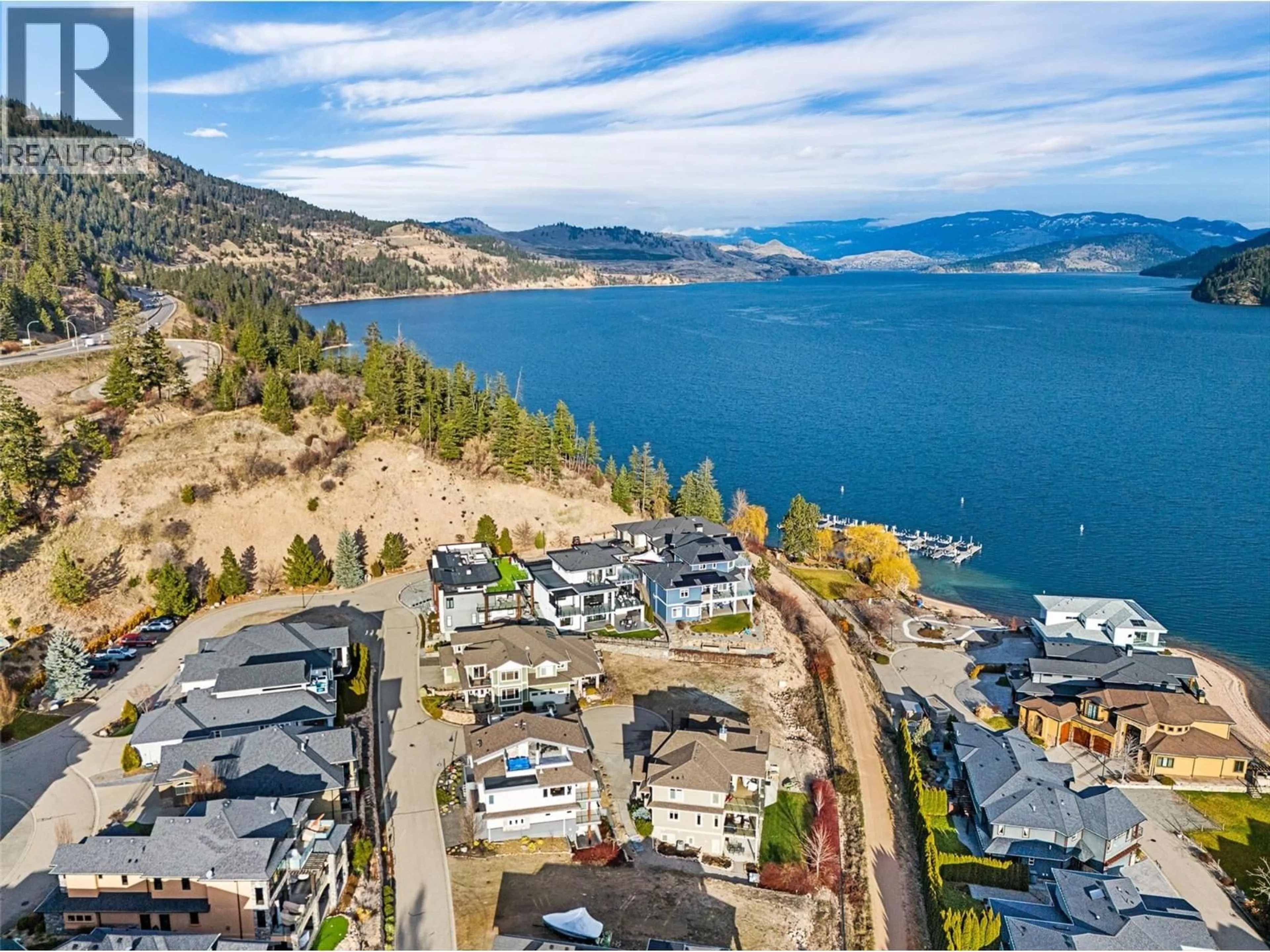 A pic from outside/outdoor area/front of a property/back of a property/a pic from drone, water/lake/river/ocean view for 20 - 18451 CRYSTAL WATERS ROAD, Oyama British Columbia V4V2G2
