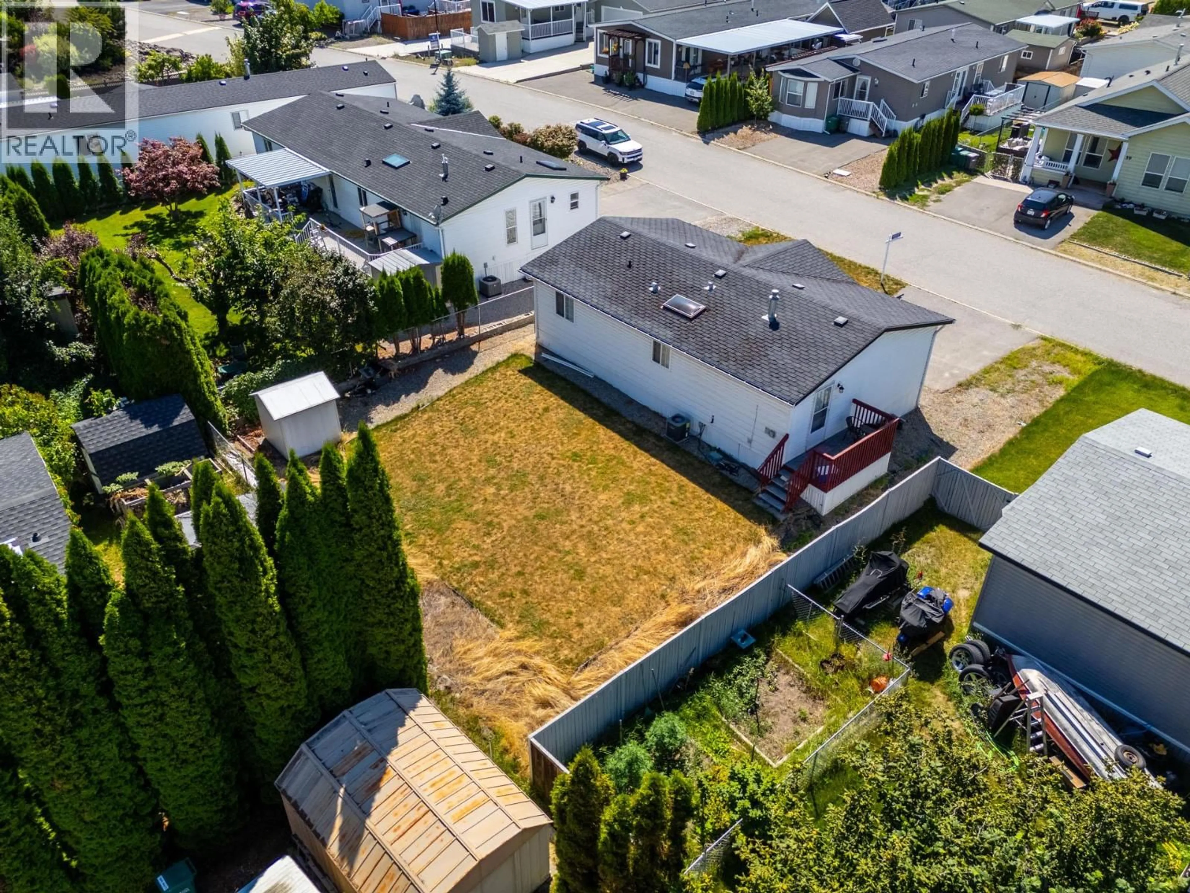 A pic from outside/outdoor area/front of a property/back of a property/a pic from drone, street for 46 - 610 KATHERINE ROAD, West Kelowna British Columbia V1Z3G2